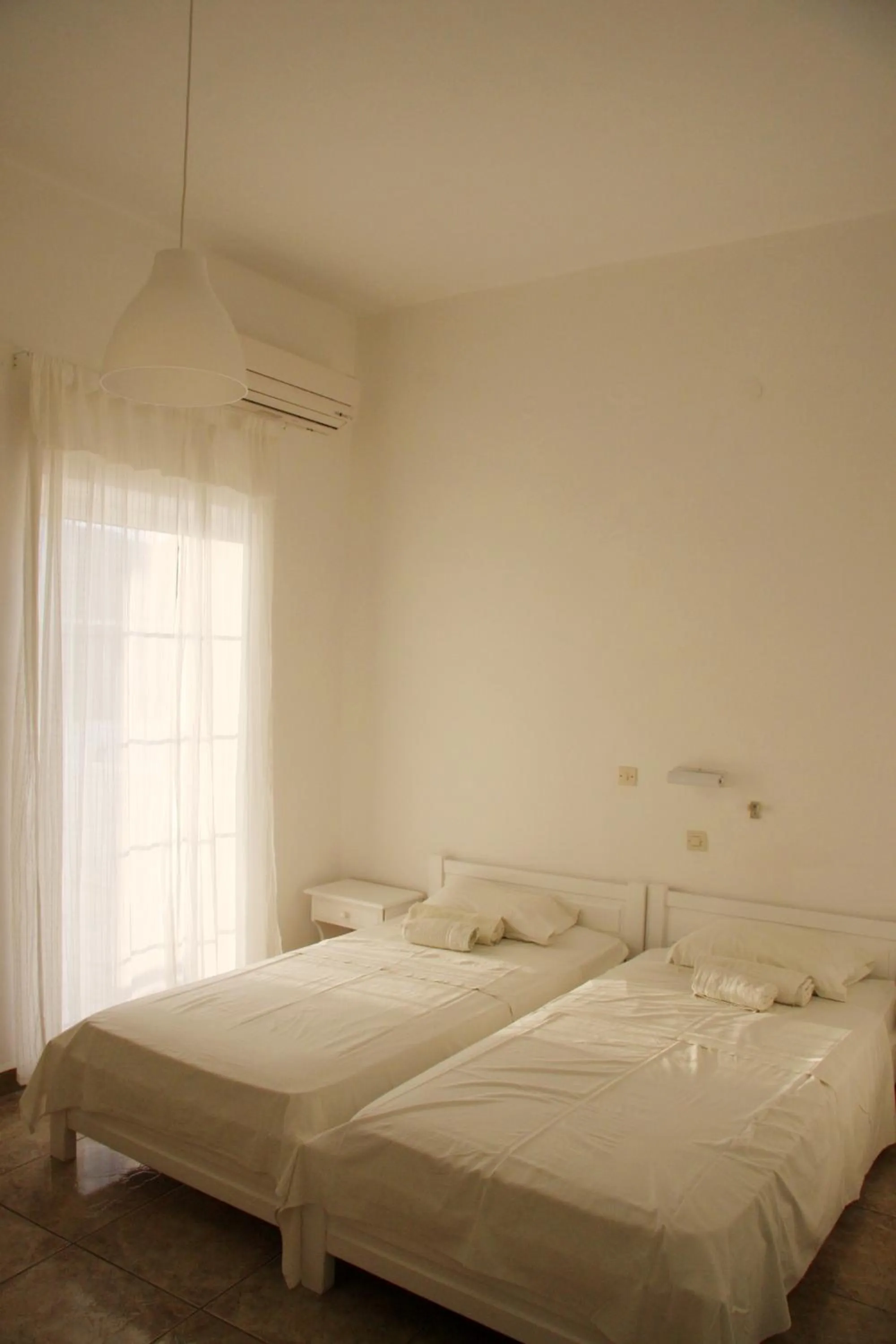 Photo of the whole room, Bed in Armadoros Hotel / Ios Backpackers