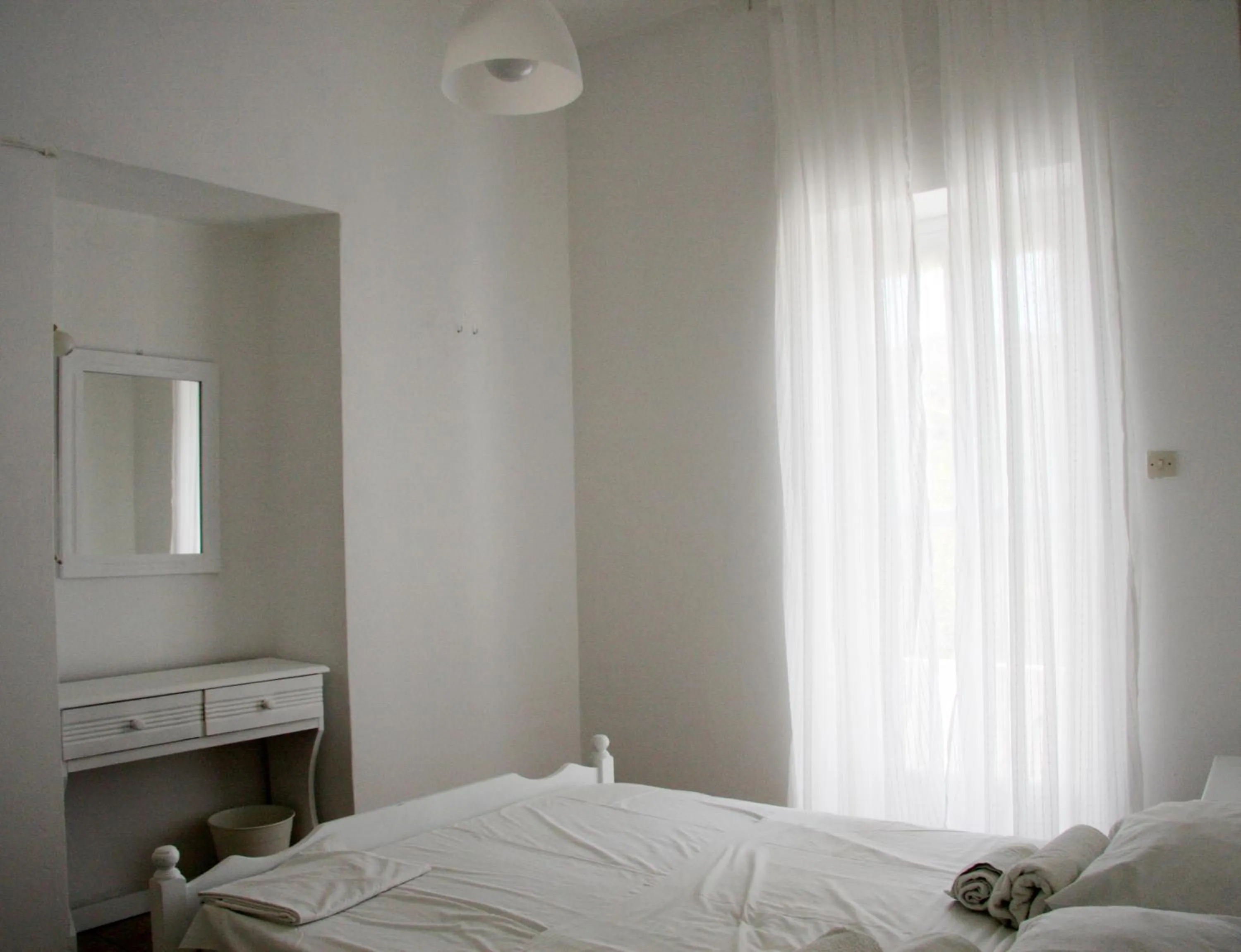 Photo of the whole room, Bed in Armadoros Hotel / Ios Backpackers