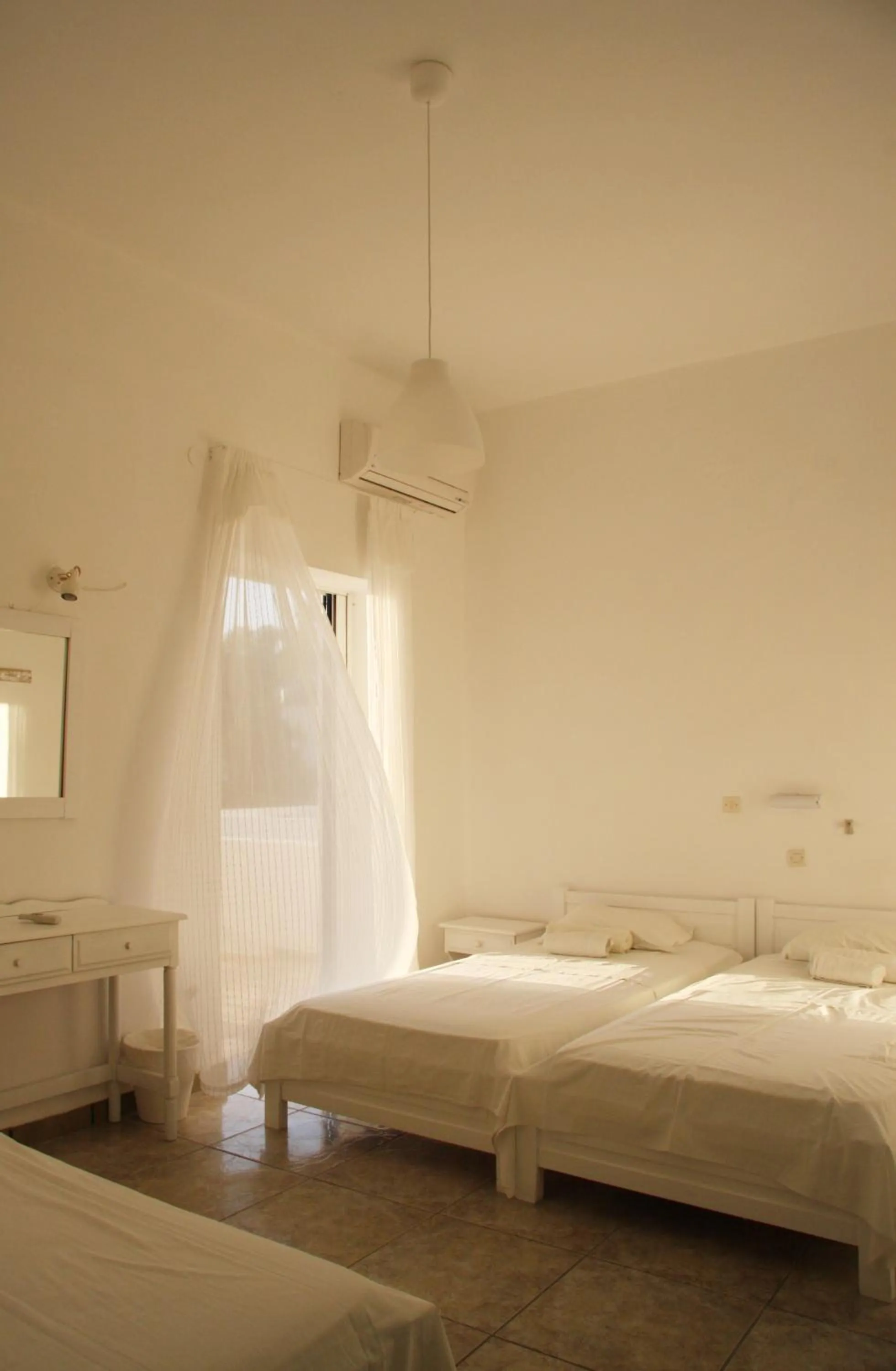 Photo of the whole room, Bed in Armadoros Hotel / Ios Backpackers