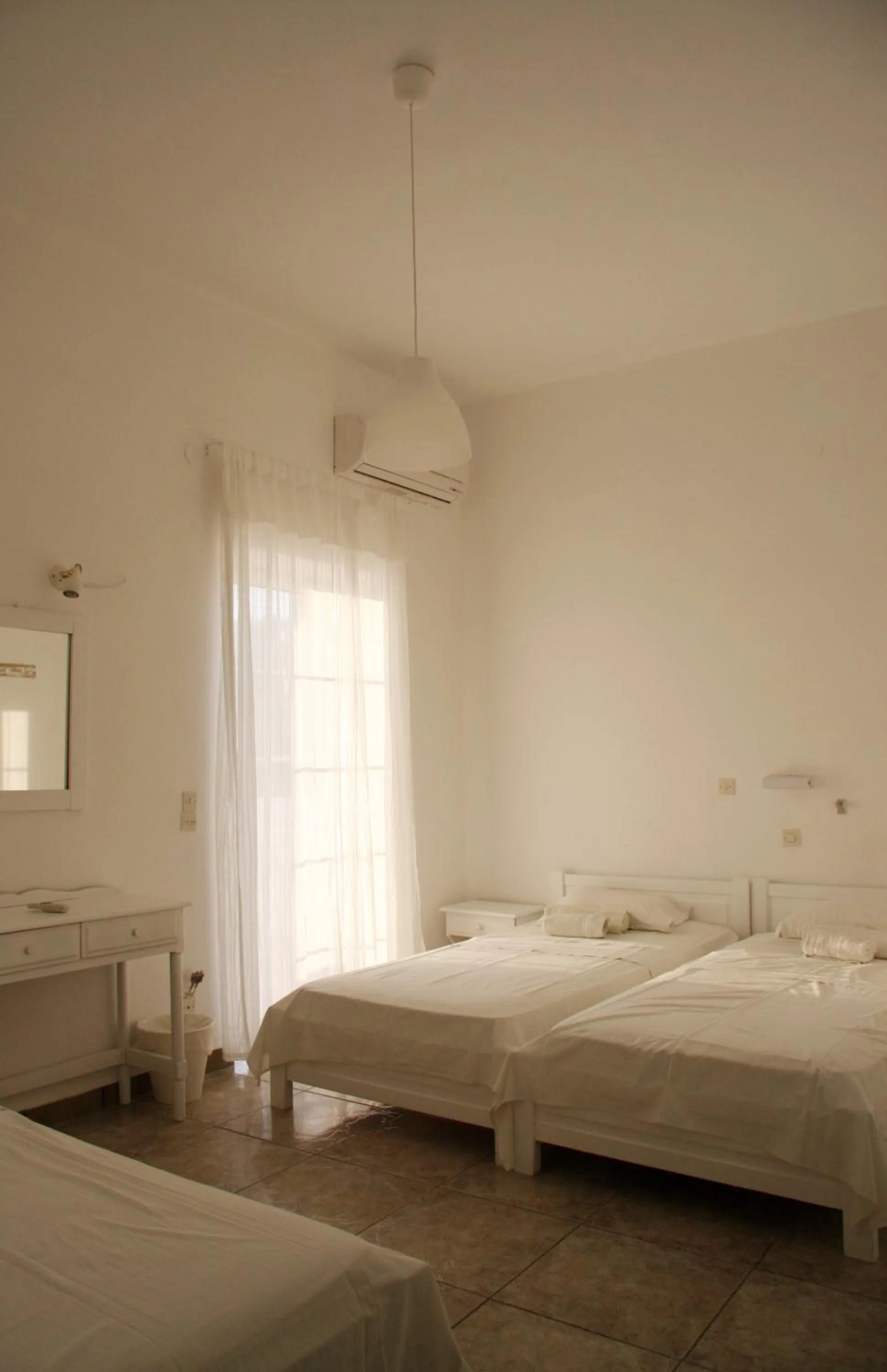 Photo of the whole room, Bed in Armadoros Hotel / Ios Backpackers