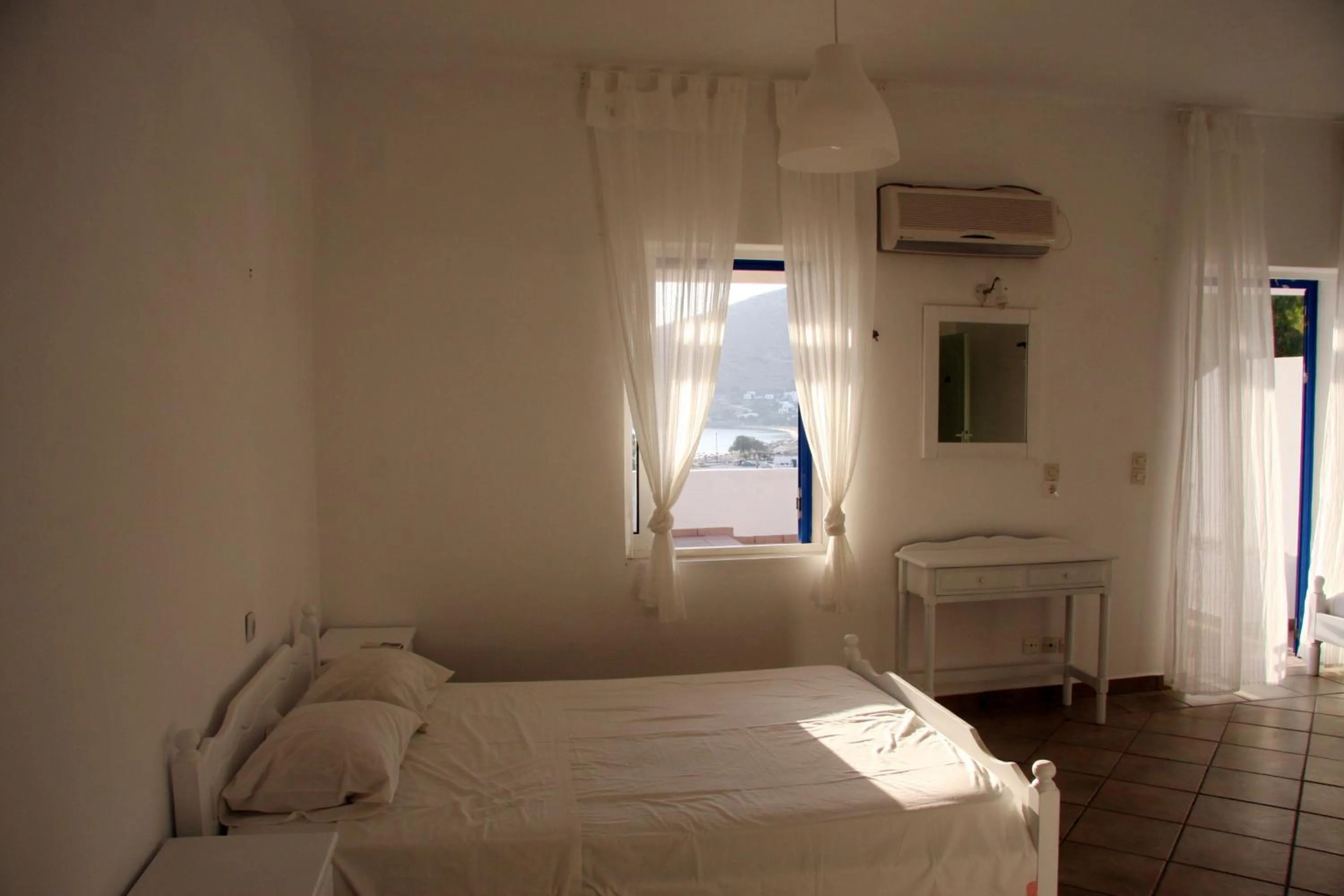 Photo of the whole room, Bed in Armadoros Hotel / Ios Backpackers