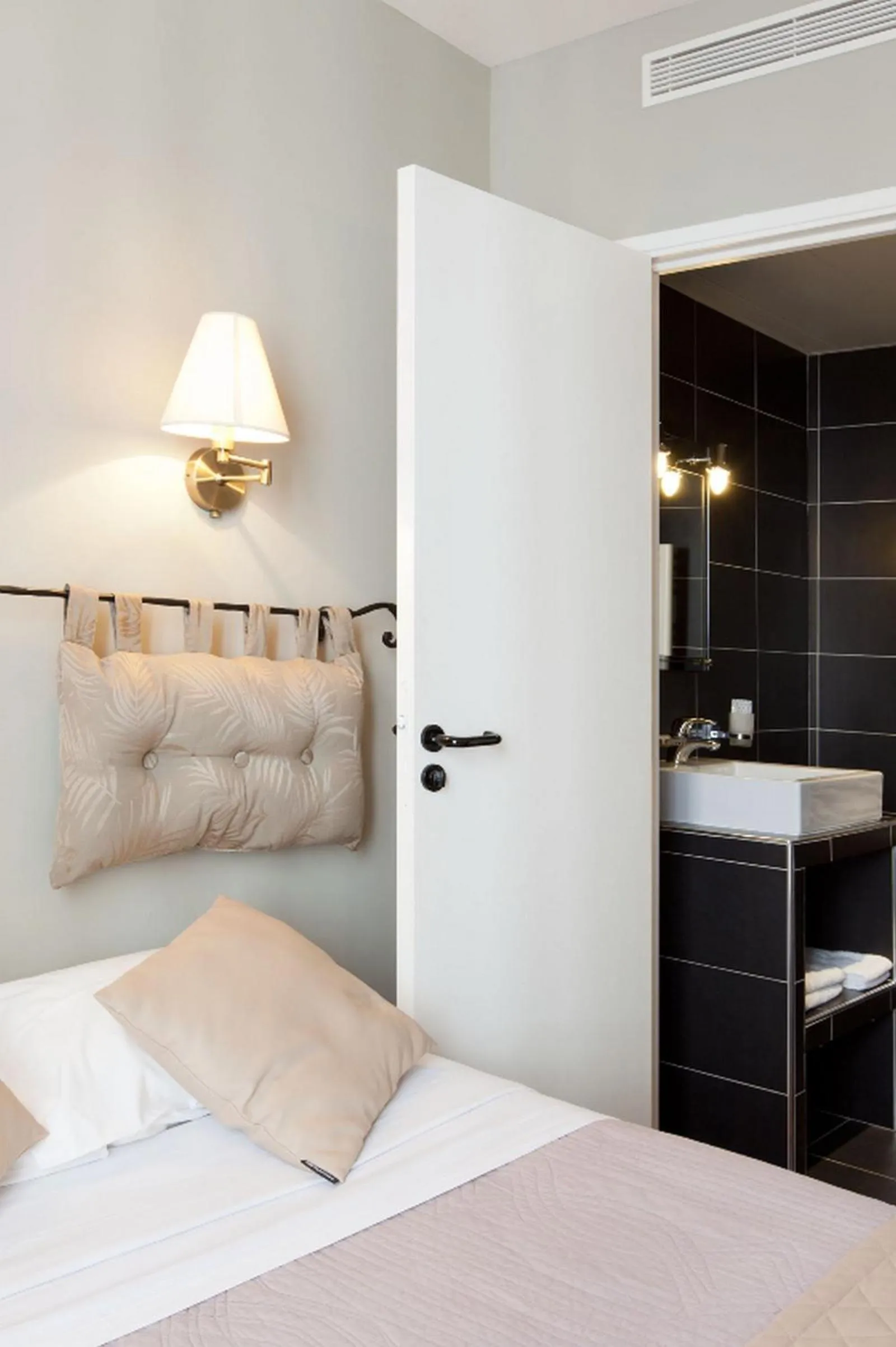 Bed in Cosmotel Hotel