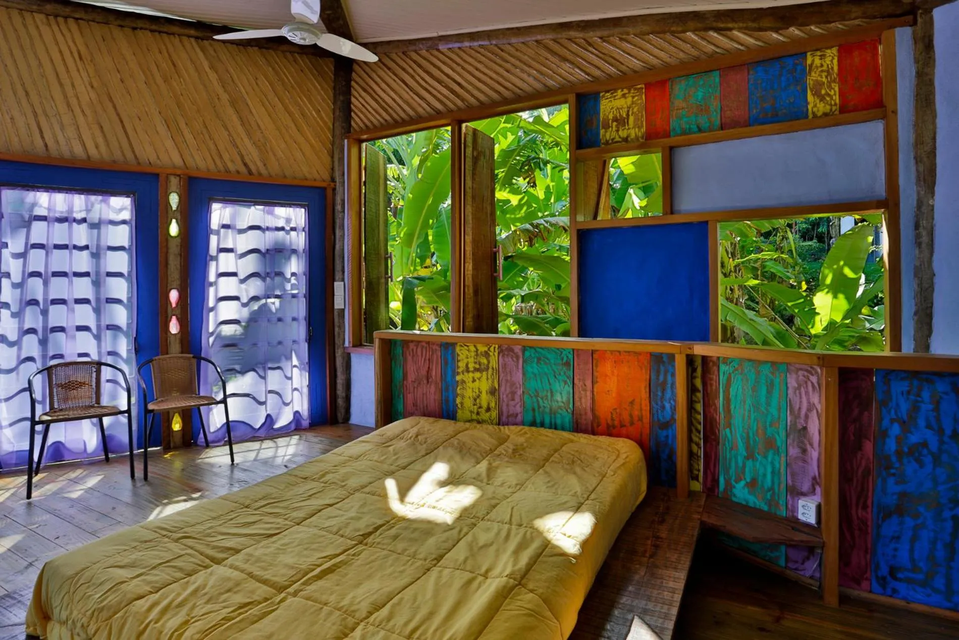 Bed in Sea View Colorful House