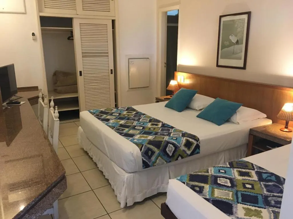 Bed in Ubatuba Palace Hotel