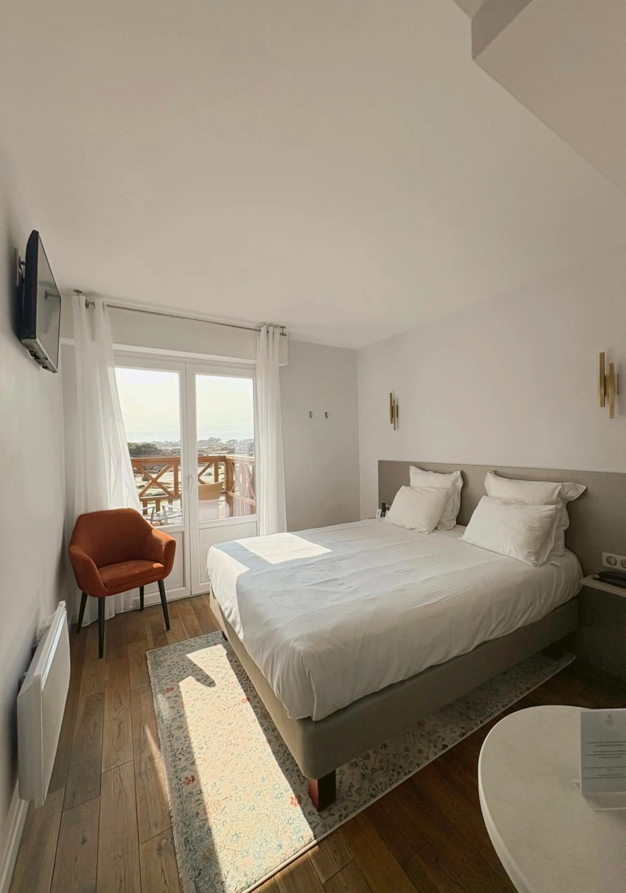 Photo of the whole room, Bed in Logis Hôtel Saint Guirec Et De La Plage