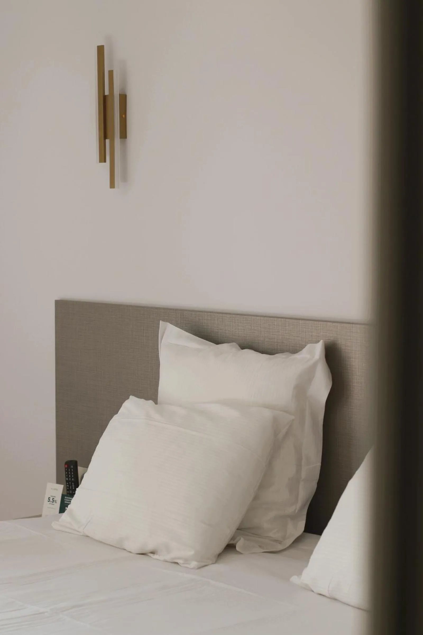 Bed in Logis Hôtel Saint Guirec Et De La Plage