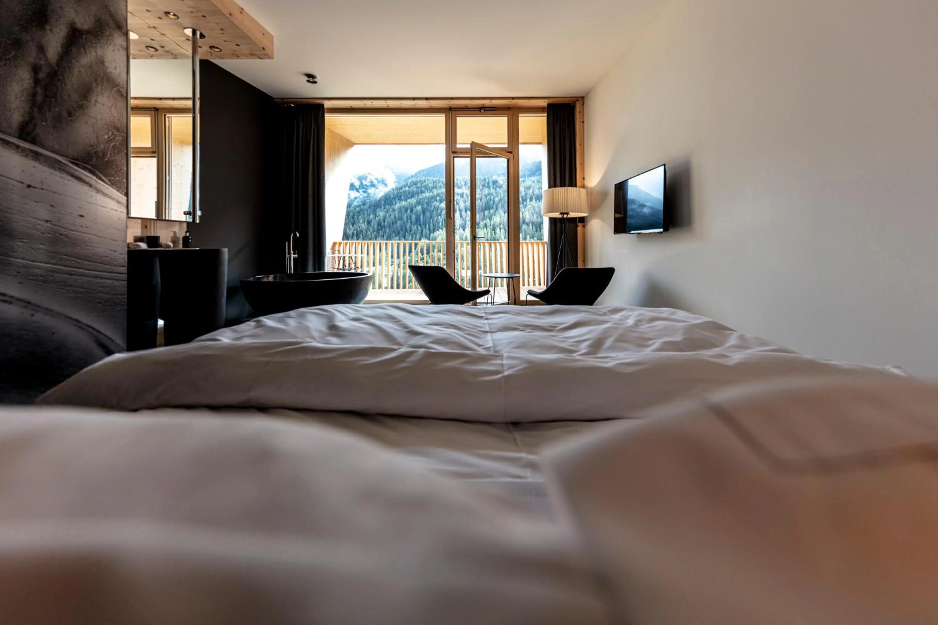 Bed in Hotel Arnica Scuol - Adults Only