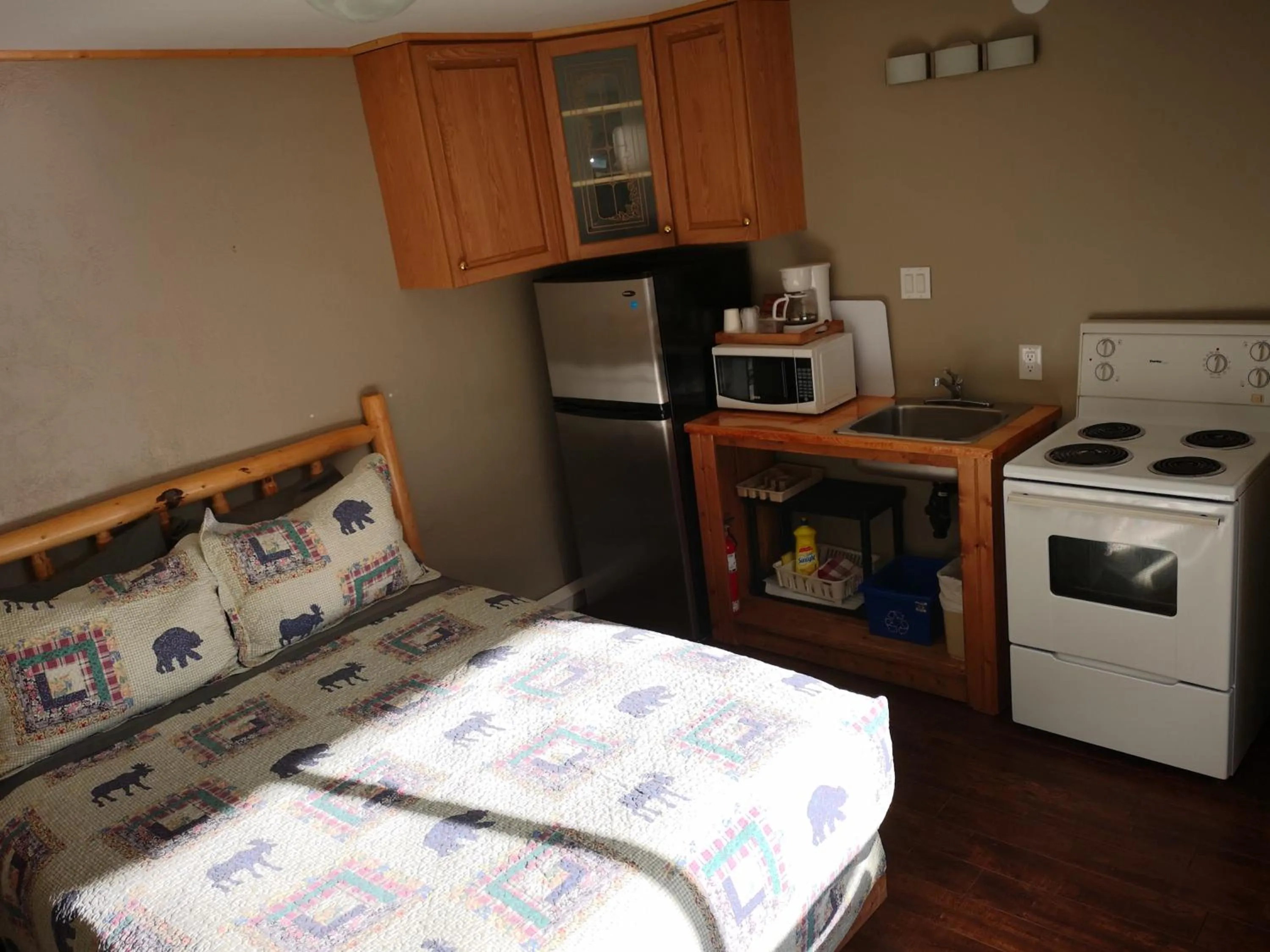 Bed in Overlook Inn & Cabins