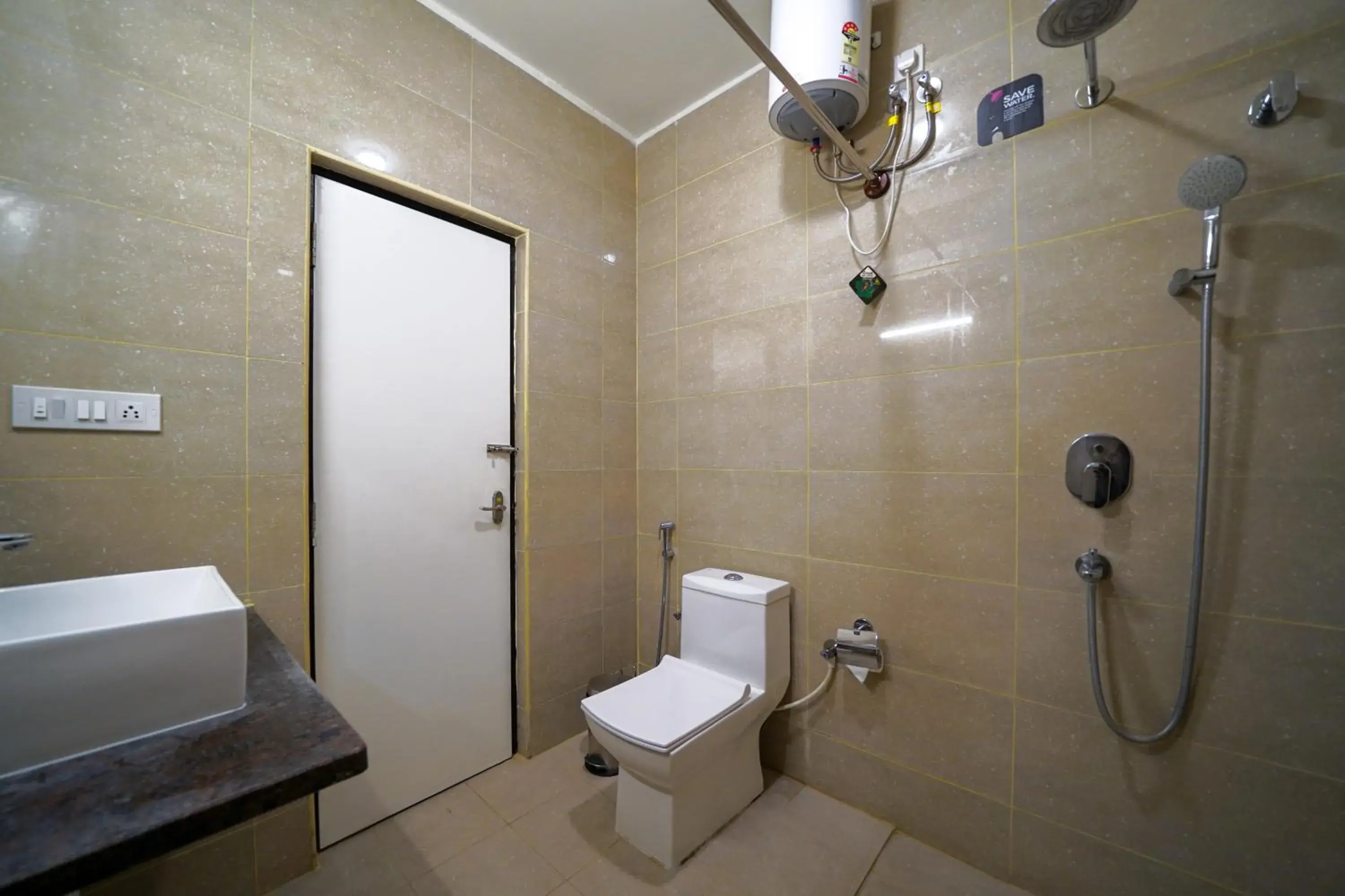 Toilet in Olive Zip Indiranagar Metro by Embassy Group Toilet in Olive Zip Indiranagar Metro by Embassy Group