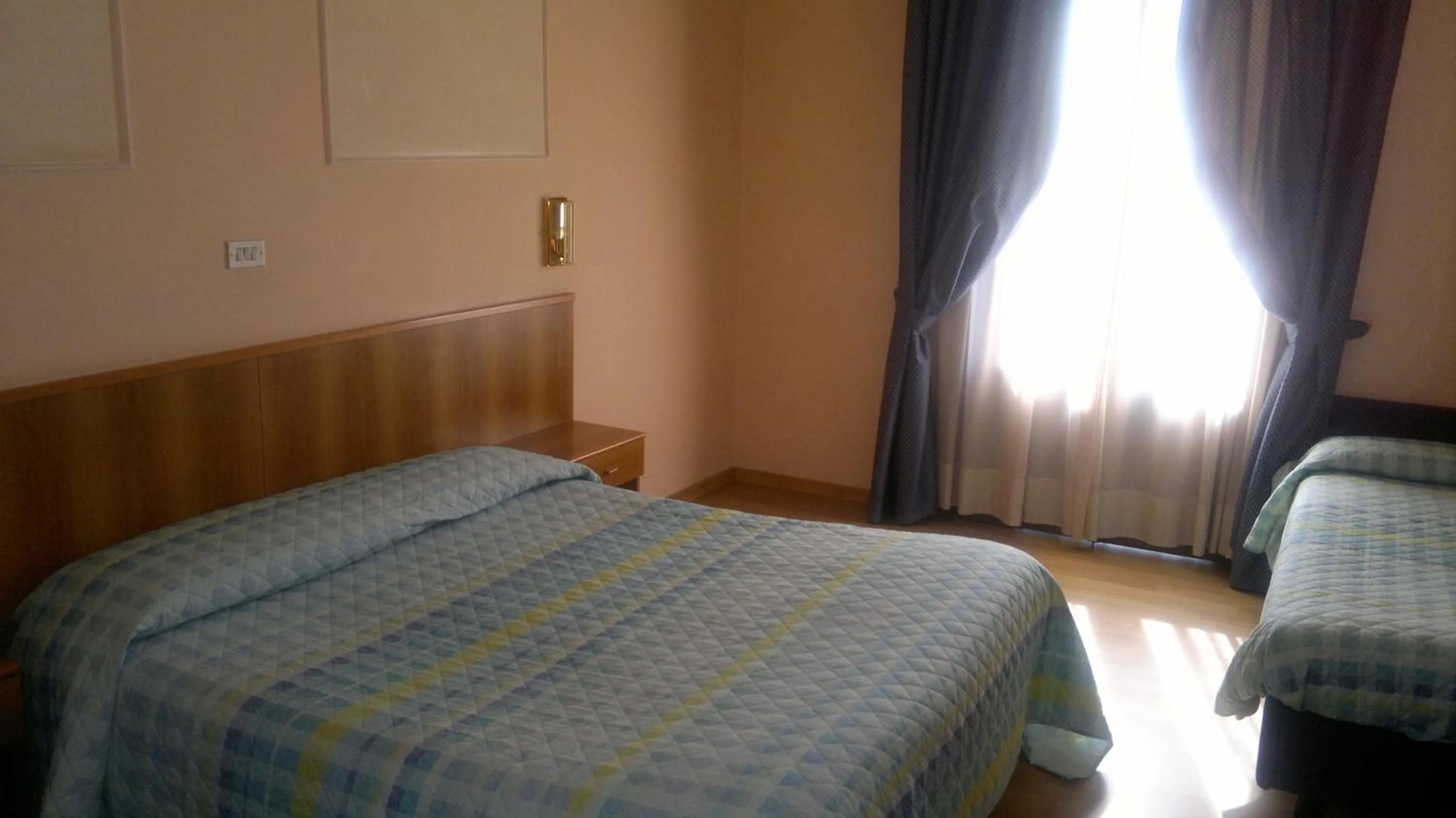 Photo of the whole room, Bed in Hotel Porziuncola