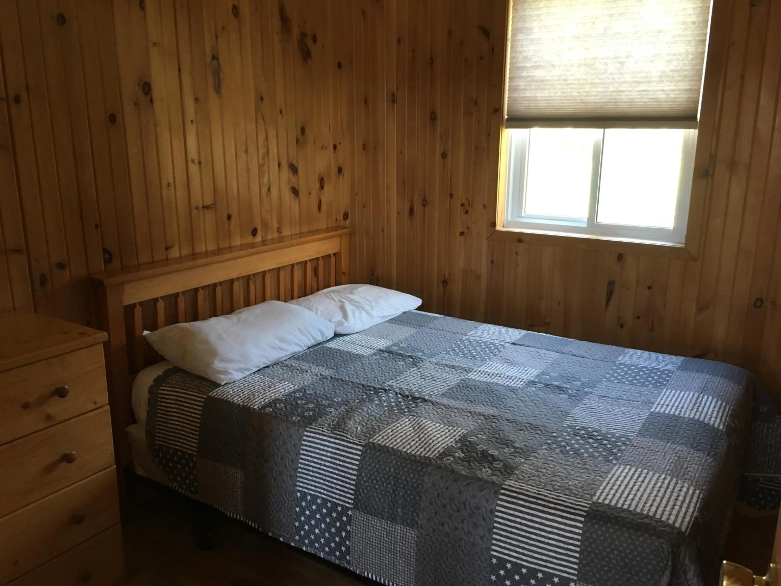 Bed in Merland Park Cottages and Motel