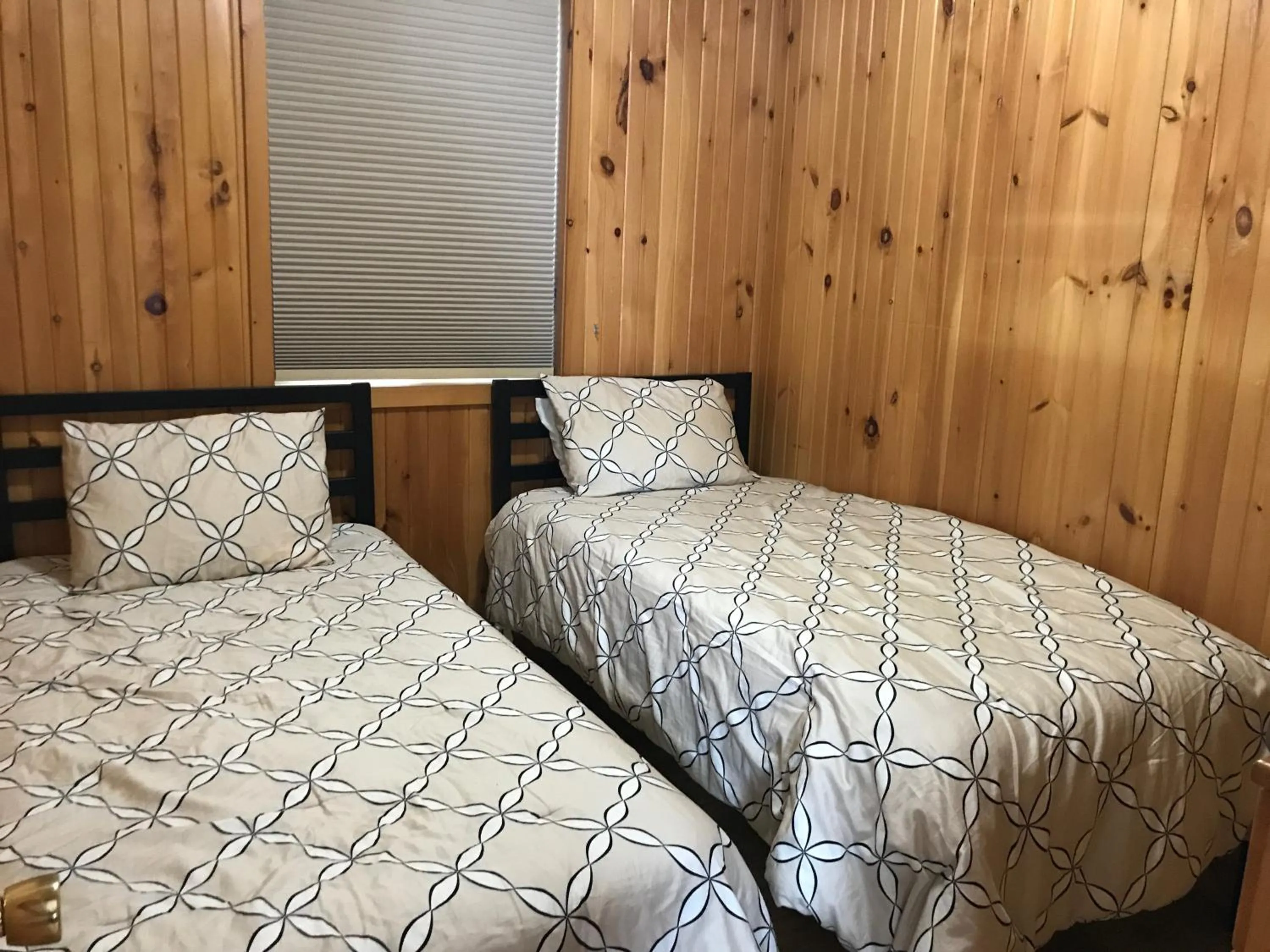 Bed in Merland Park Cottages and Motel