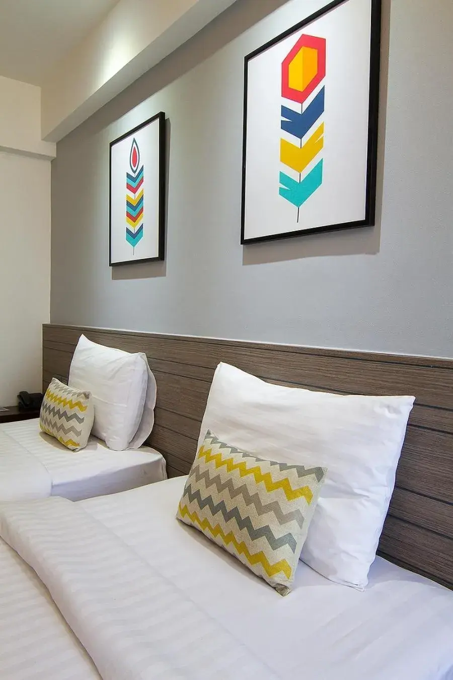 Bed in Bossotel Chiang Mai Bed in Bossotel Chiang Mai