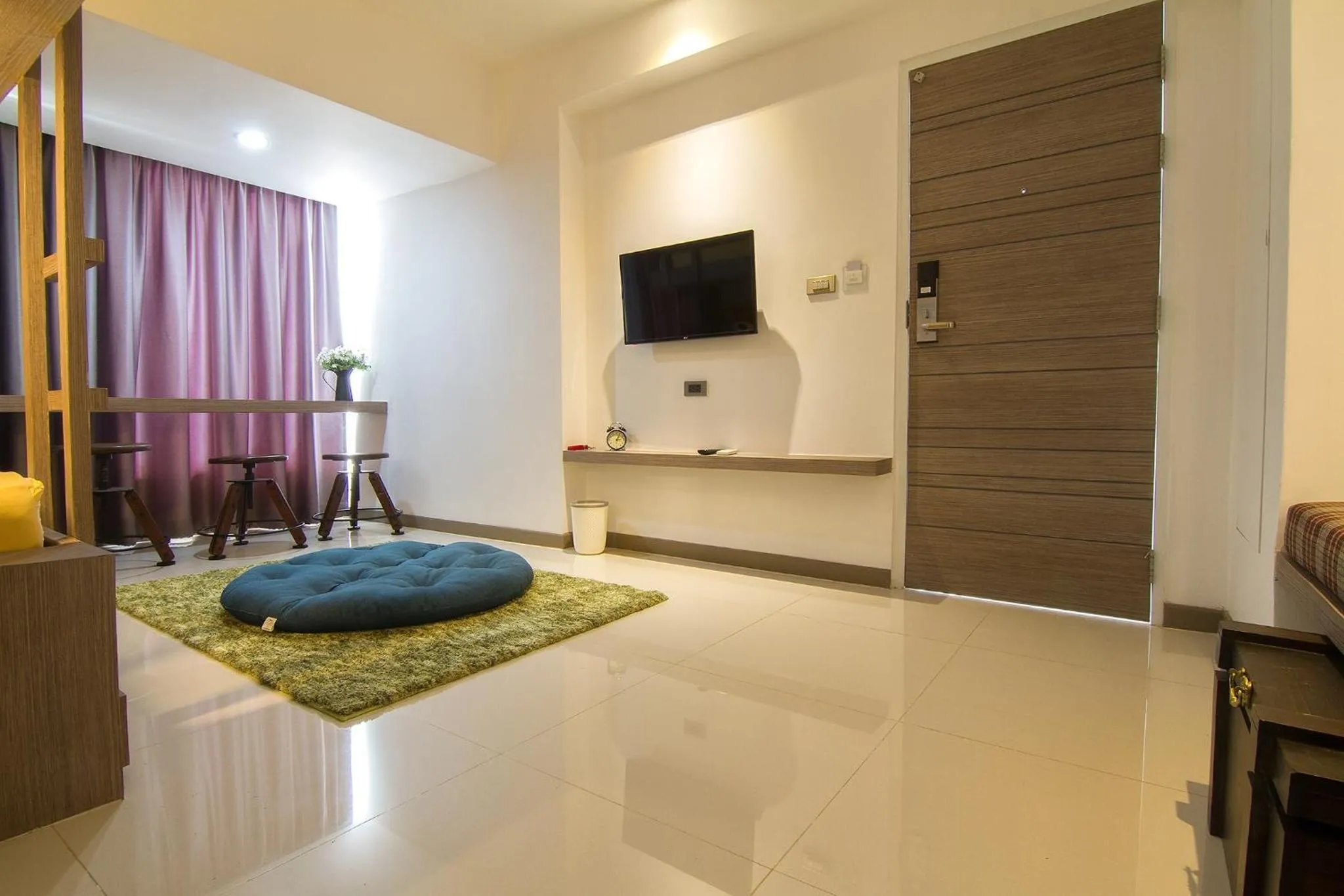 Bed in Bossotel Chiang Mai