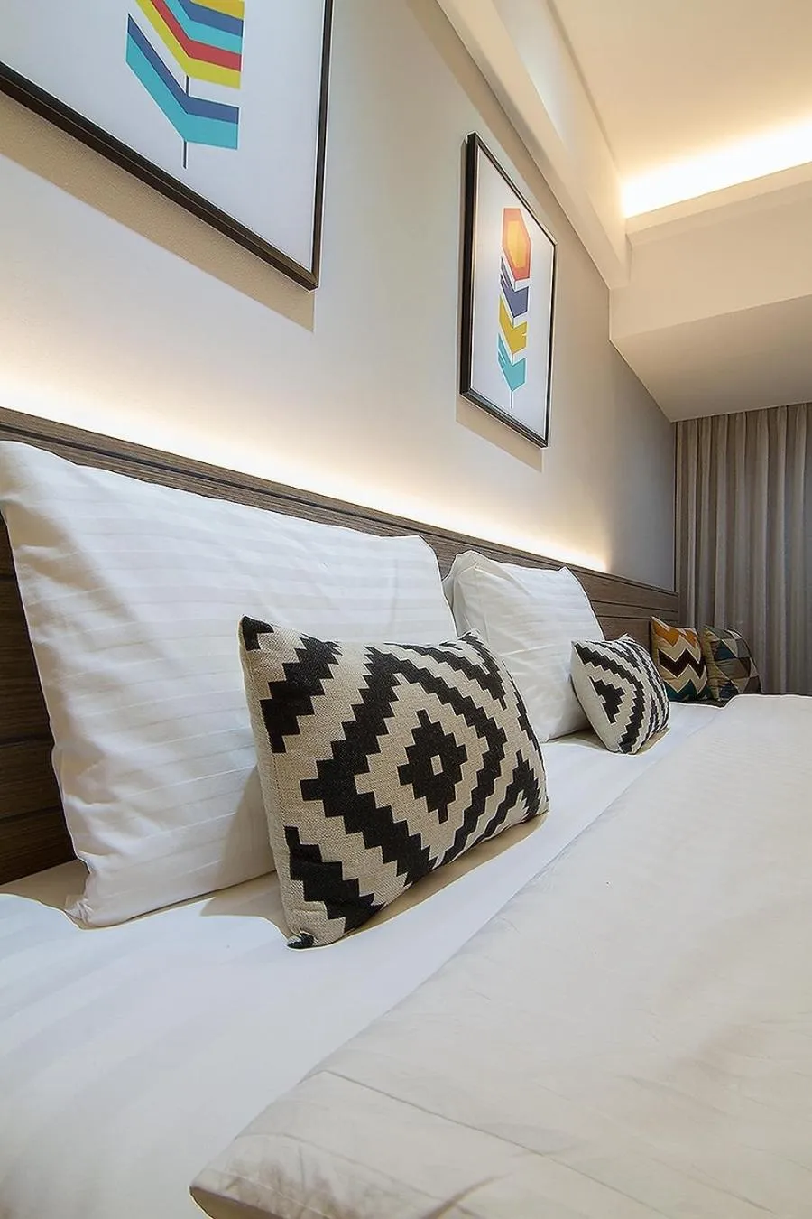 Bed in Bossotel Chiang Mai