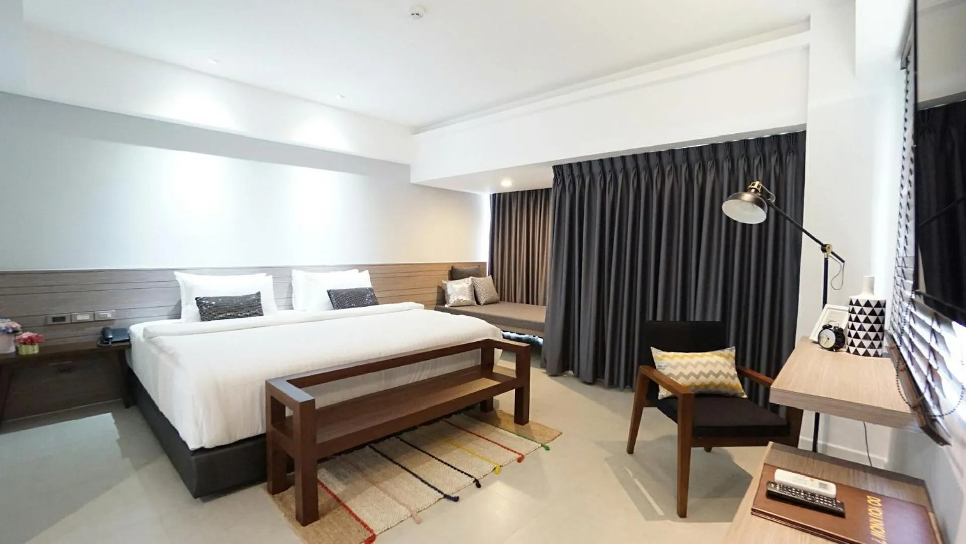 Bed in Bossotel Chiang Mai