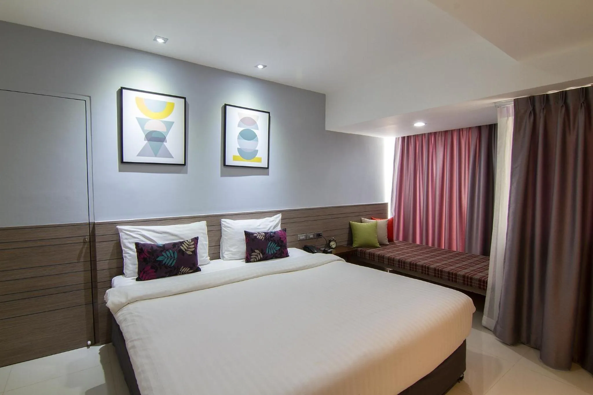 Bed in Bossotel Chiang Mai