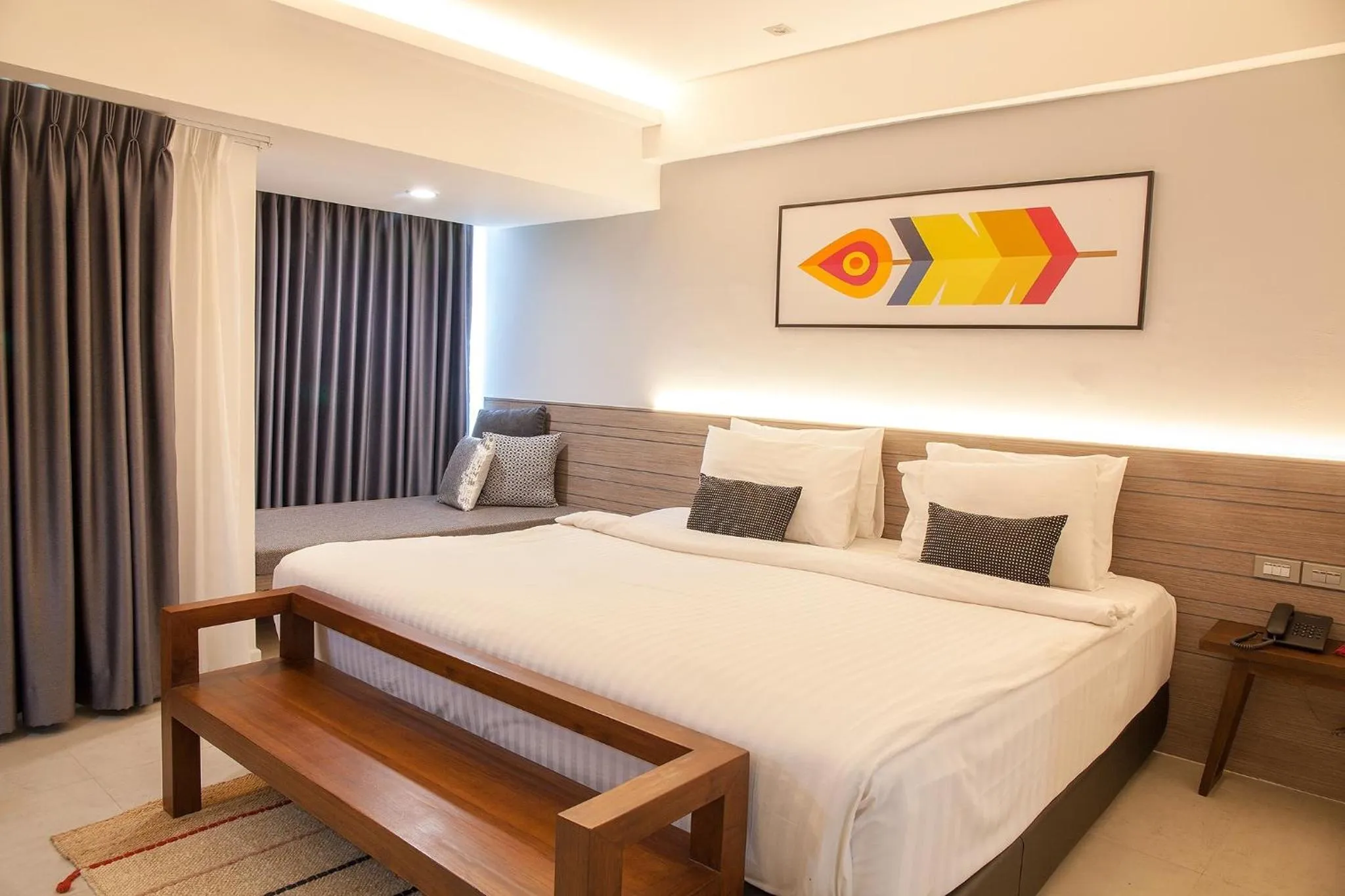 Bed in Bossotel Chiang Mai