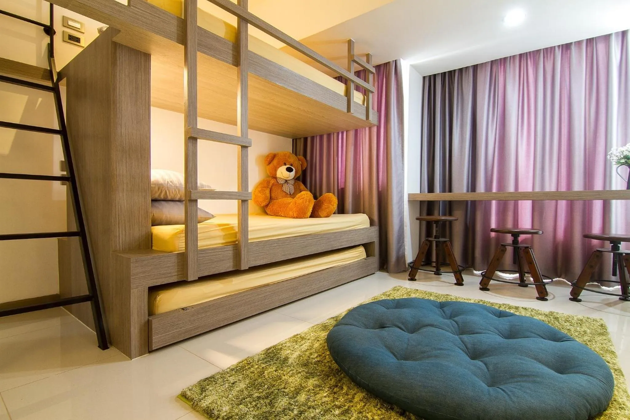 Bed in Bossotel Chiang Mai