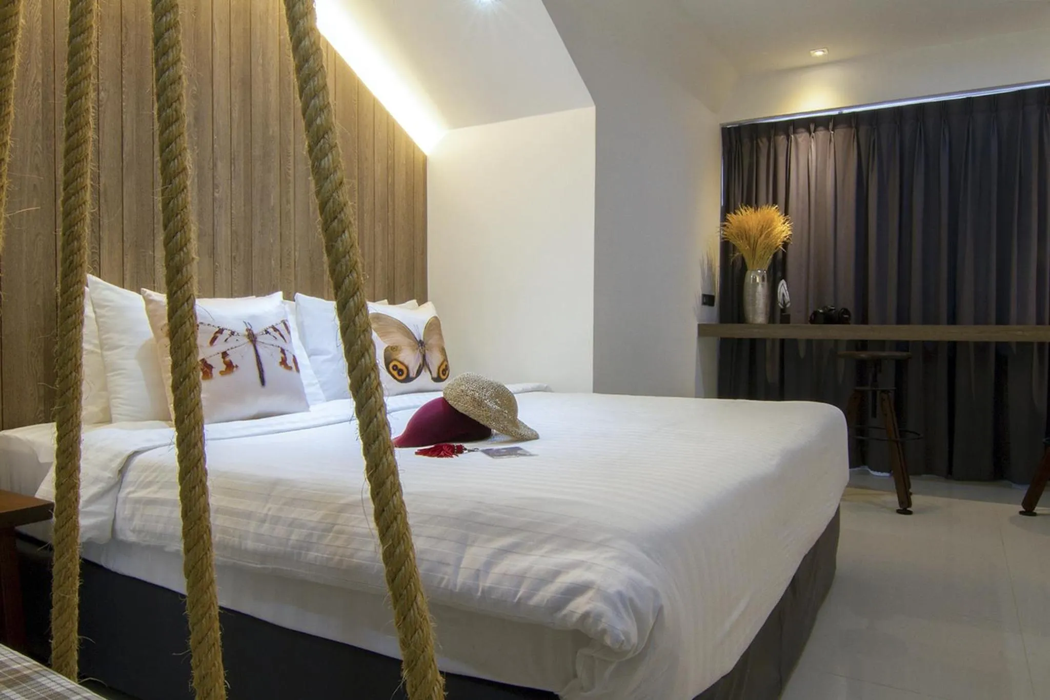 Bed in Bossotel Chiang Mai