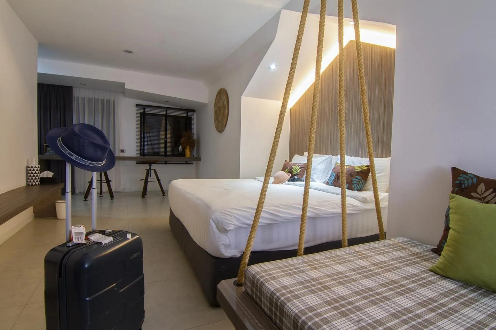 Bed in Bossotel Chiang Mai