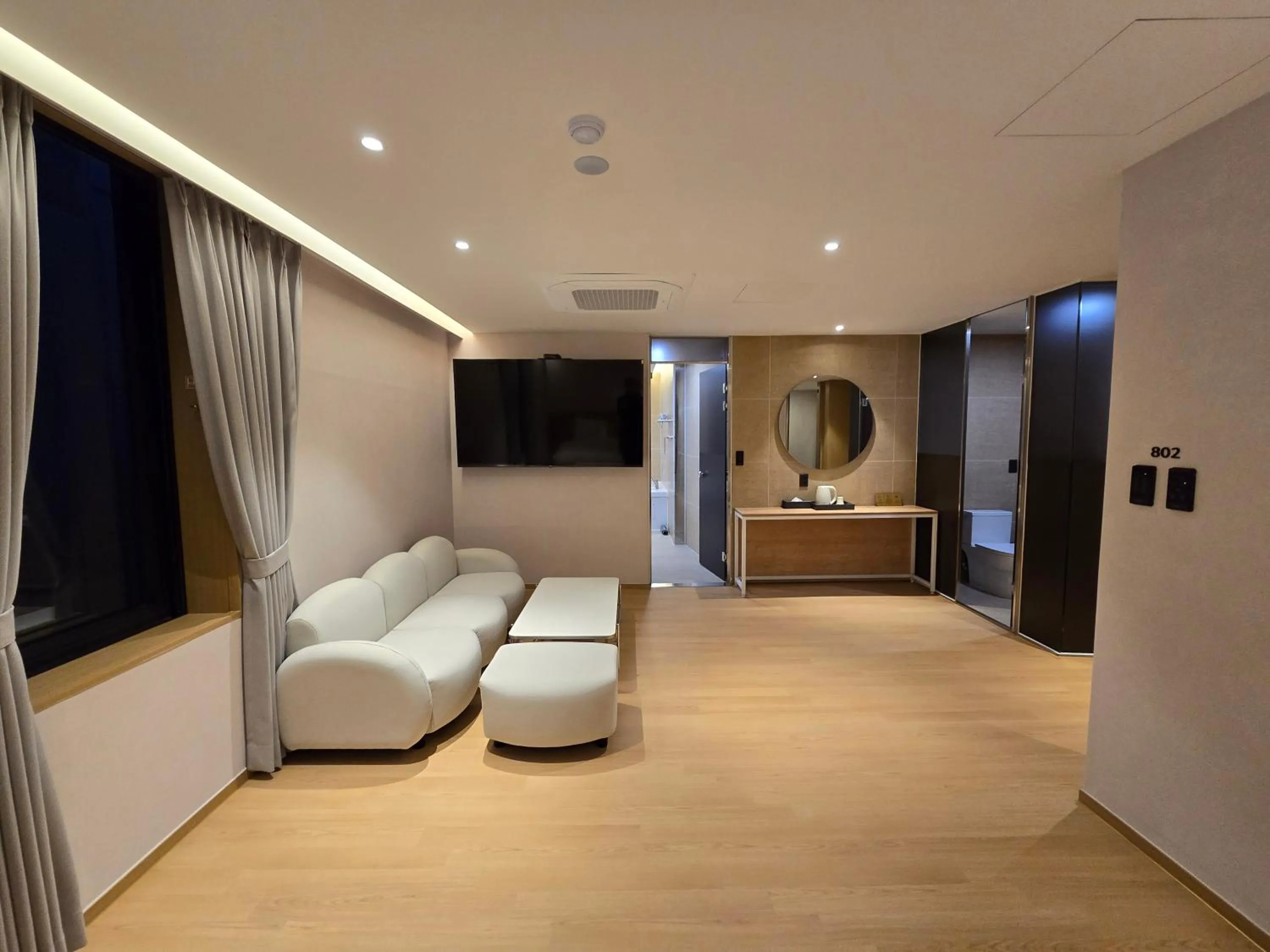 Bed in Tria Business & Boutique Hotel