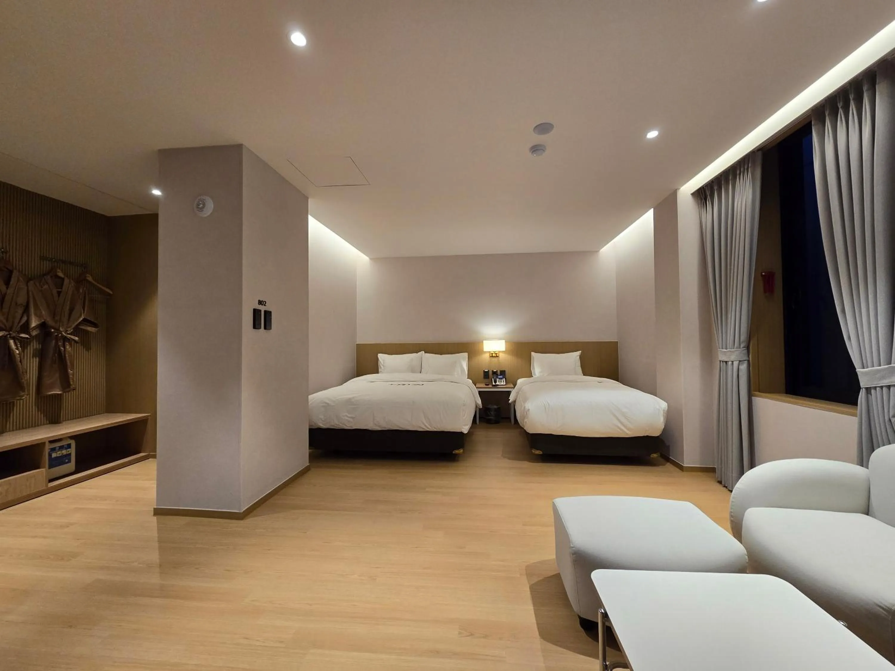 Bed in Tria Business & Boutique Hotel