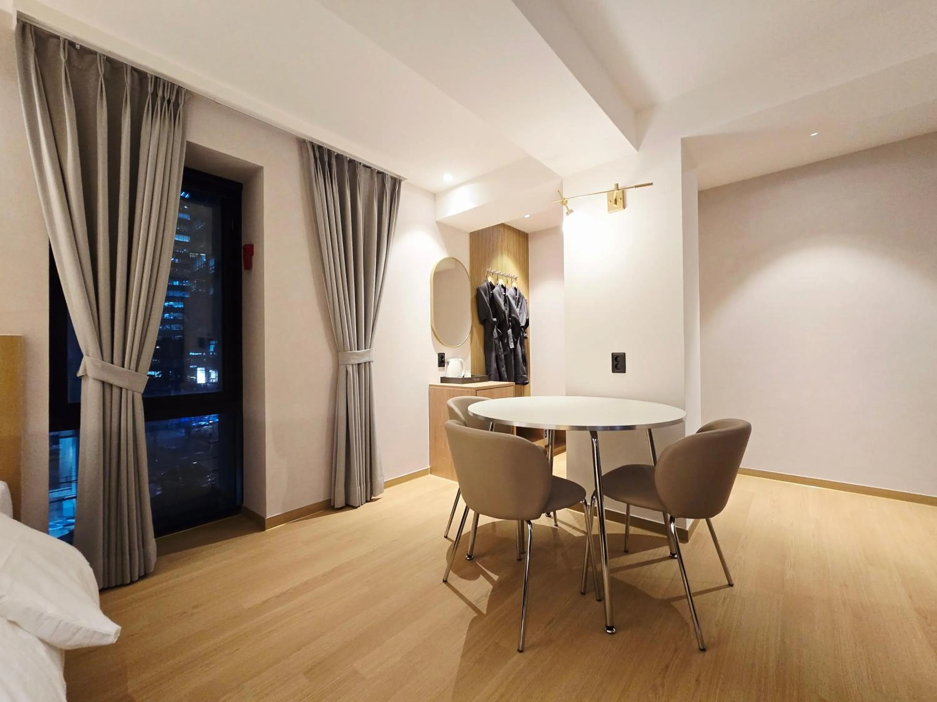 Bed in Tria Business & Boutique Hotel