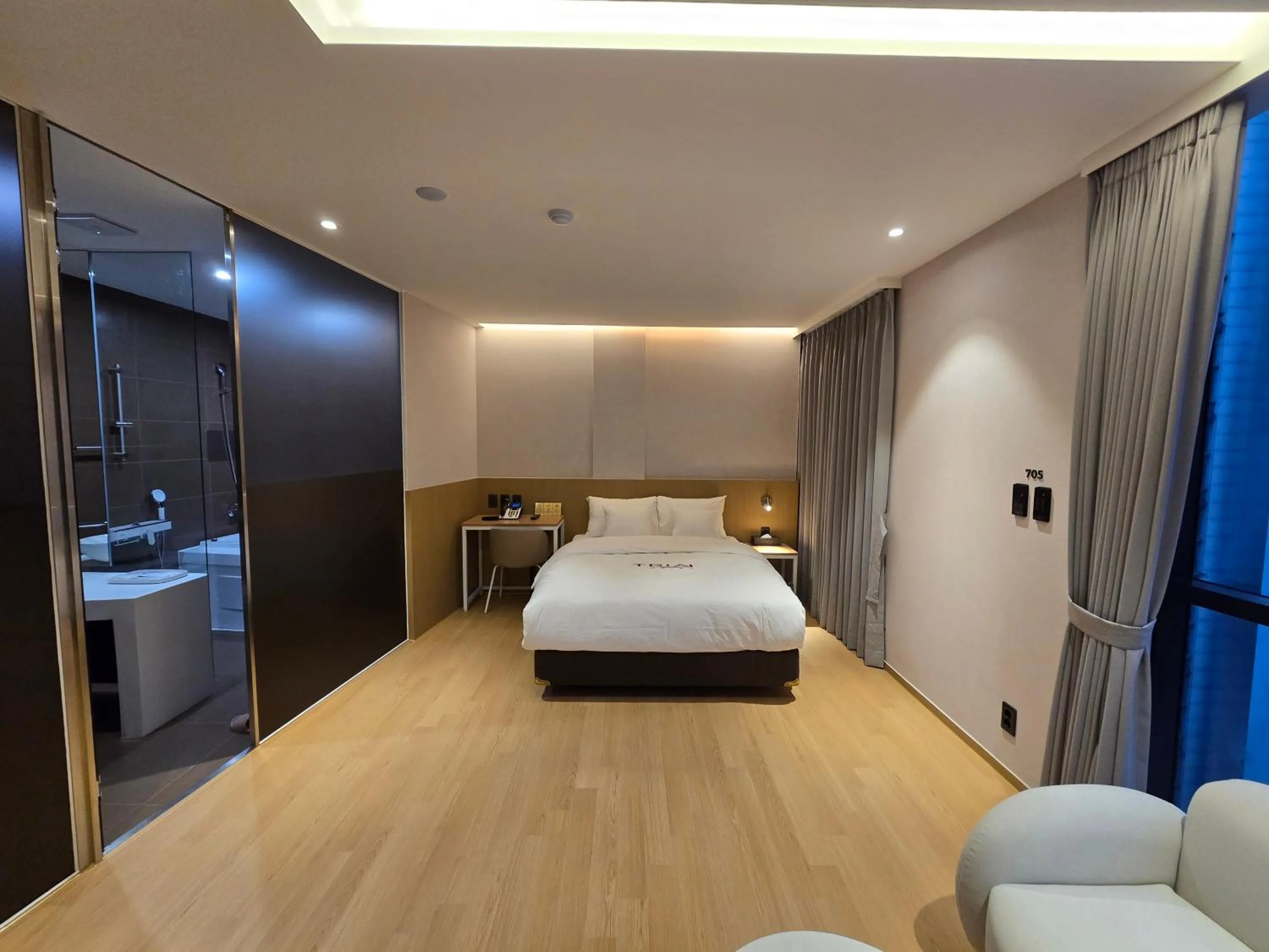 Bed in Tria Business & Boutique Hotel