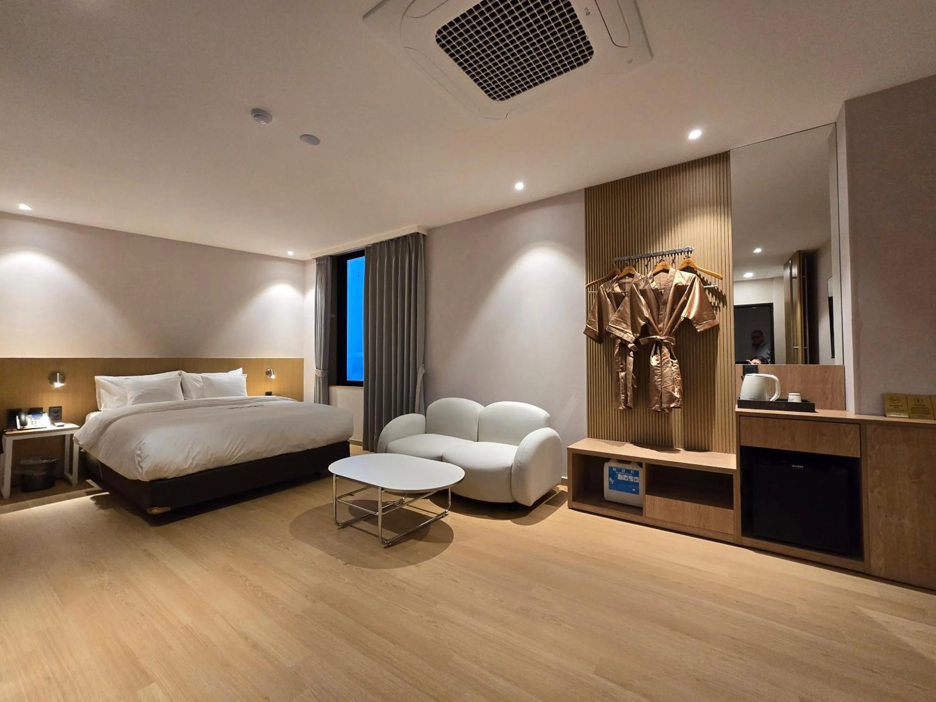 Bed in Tria Business & Boutique Hotel