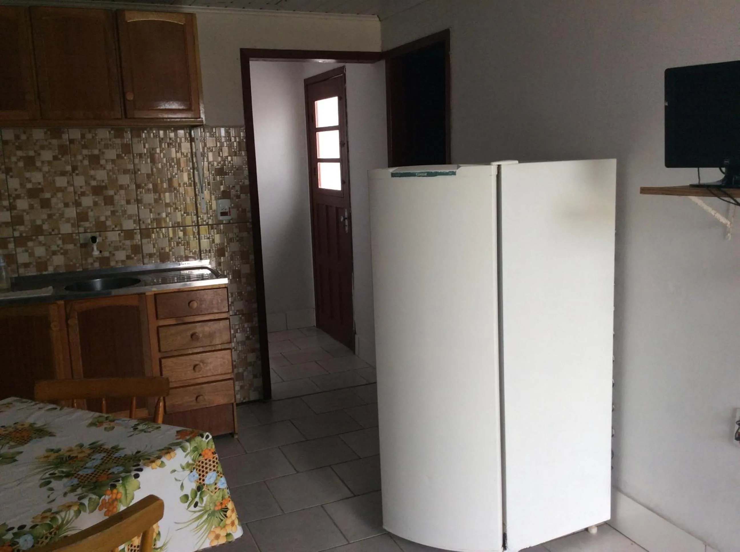 Kitchen or kitchenette in Pousada do Mar