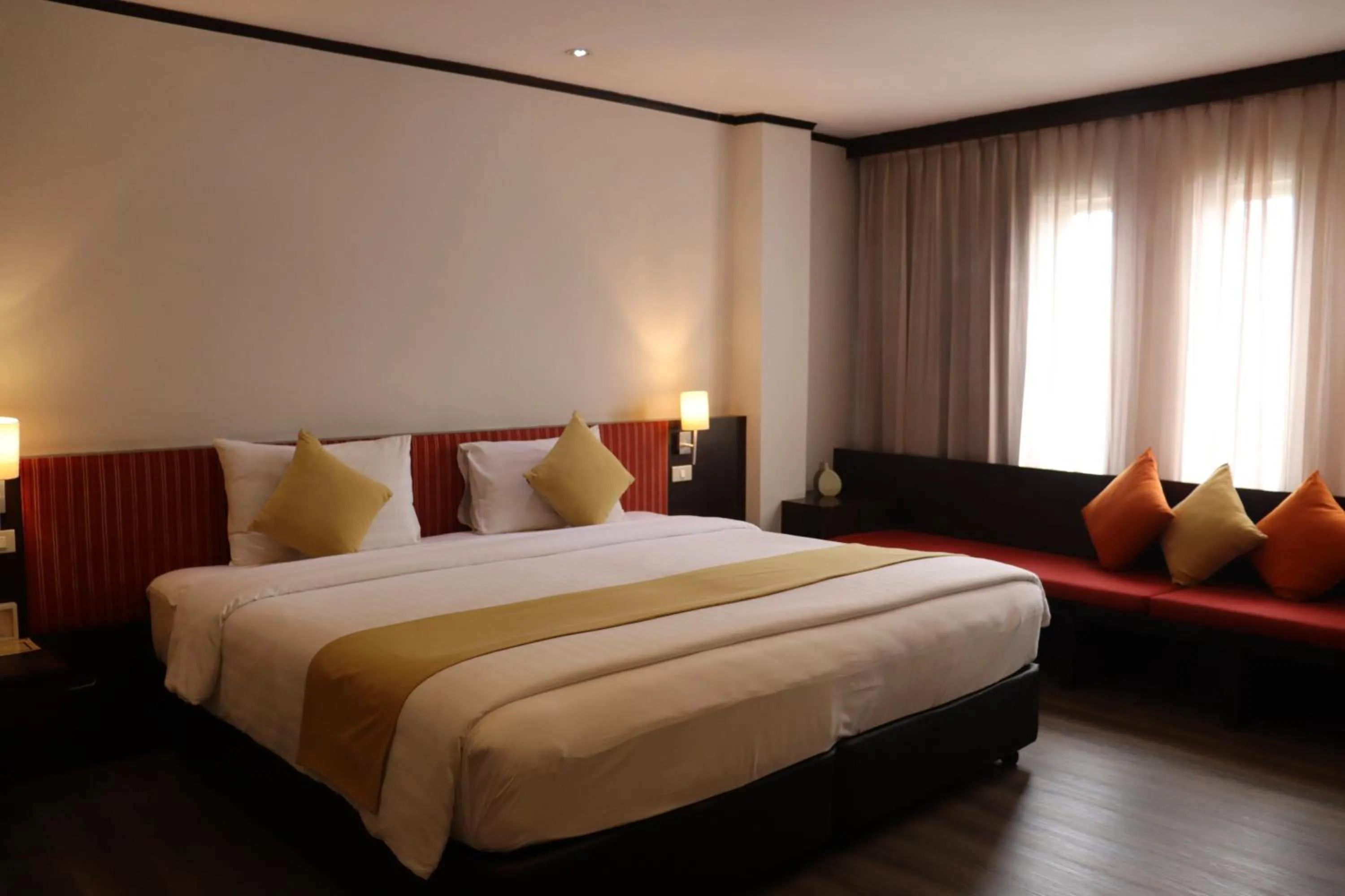 Bed in Bossotel Bangkok