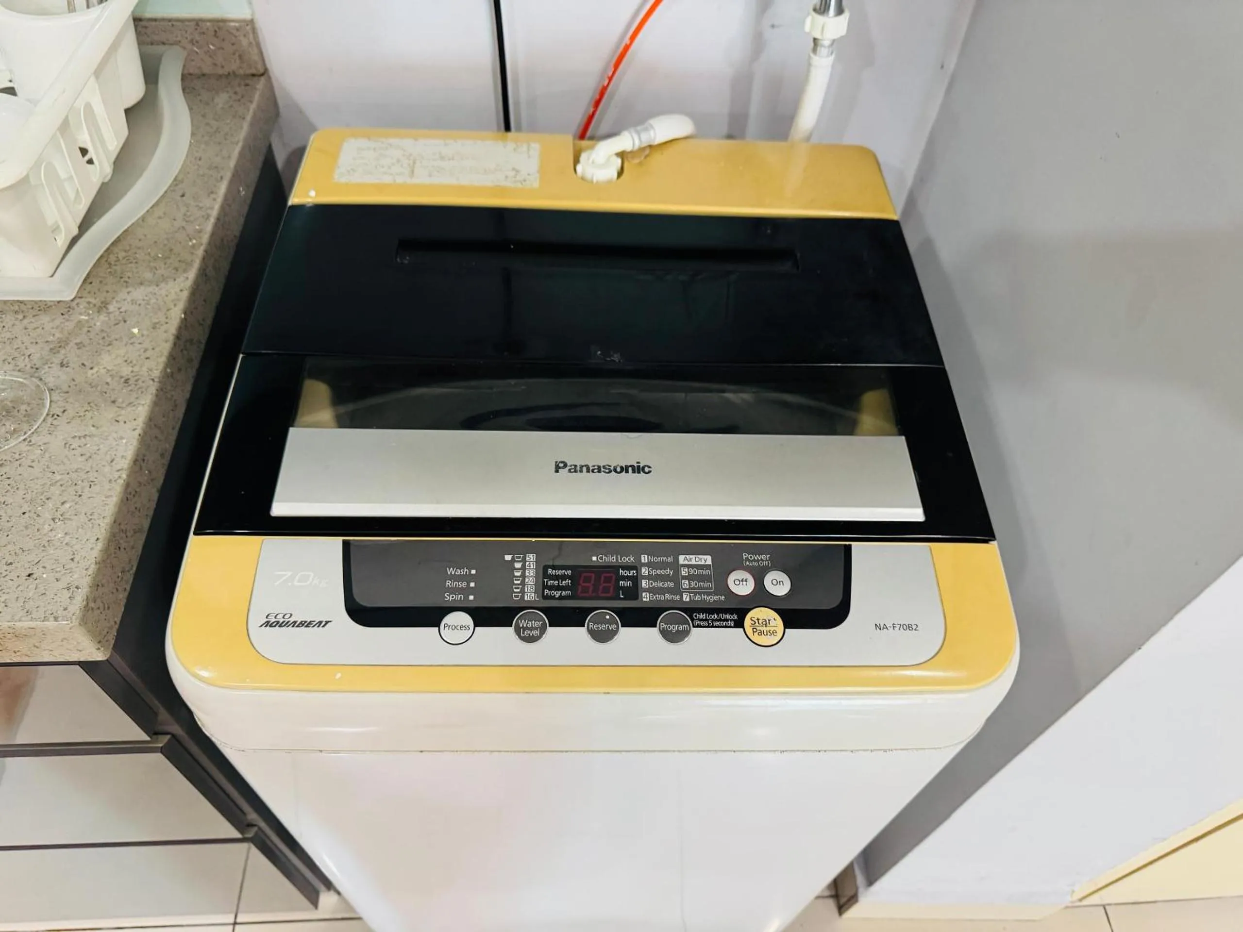 laundry in Hejmo Suites