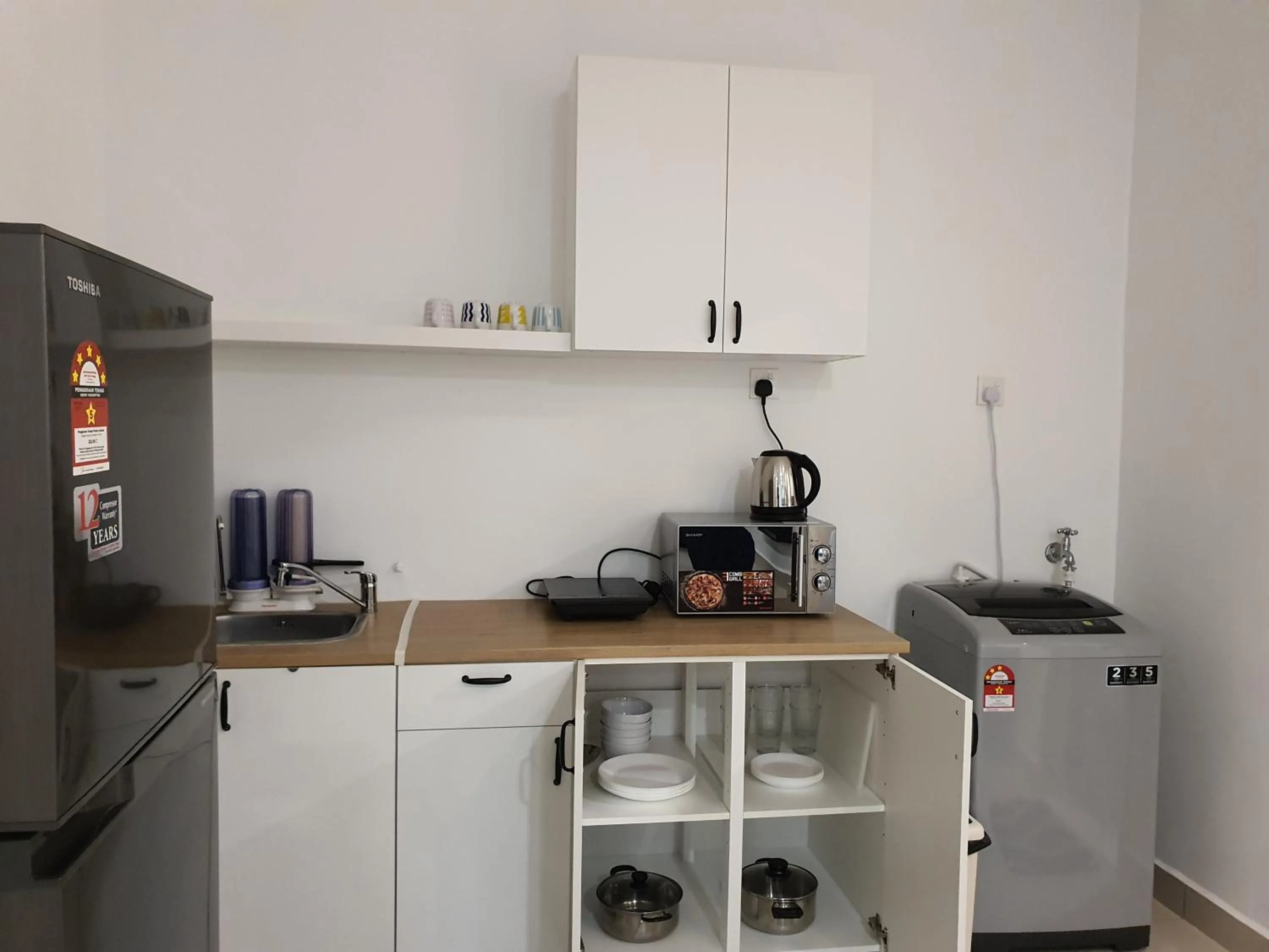 Kitchen or kitchenette in Hejmo Suites