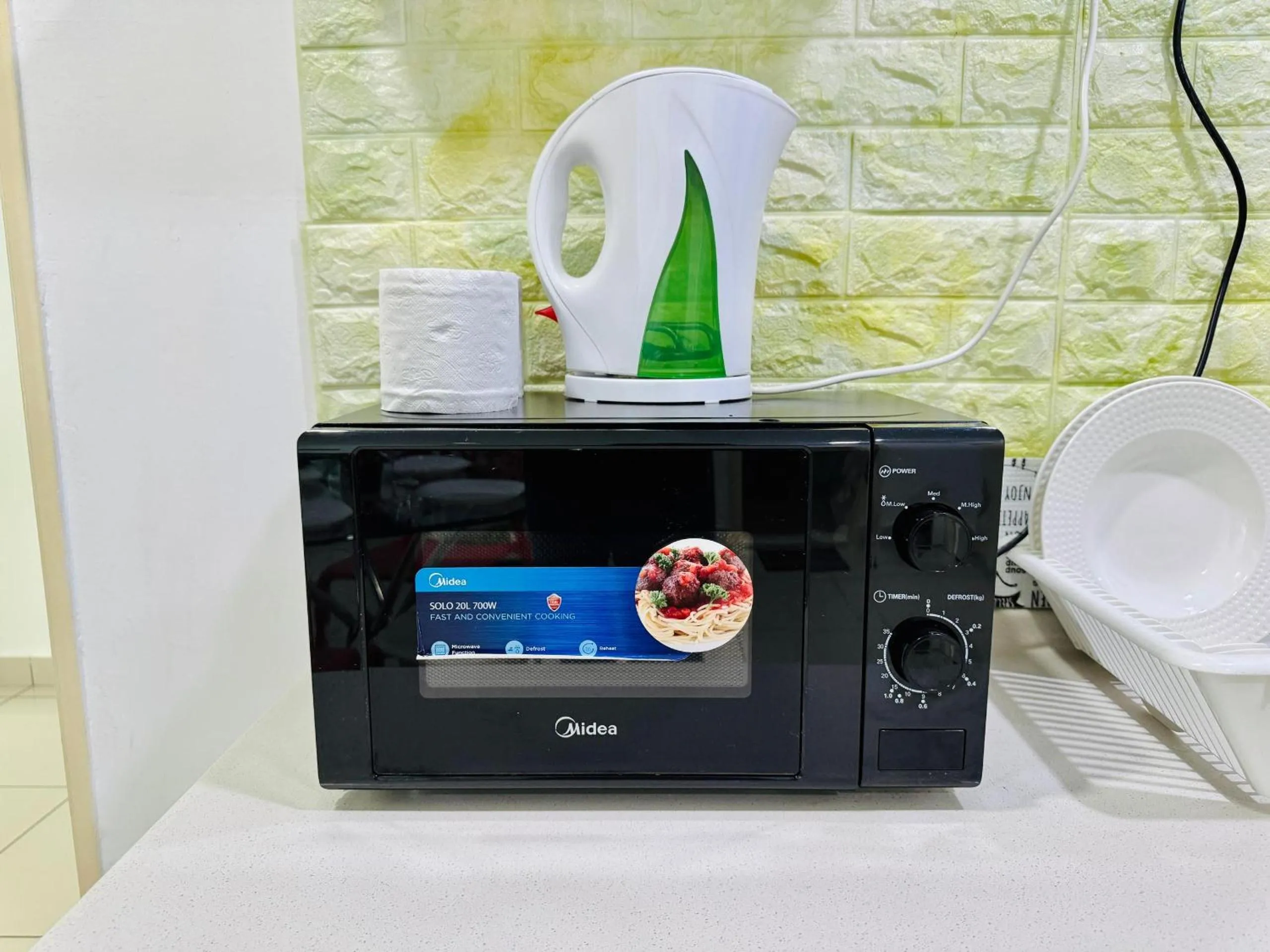 microwave in Hejmo Suites