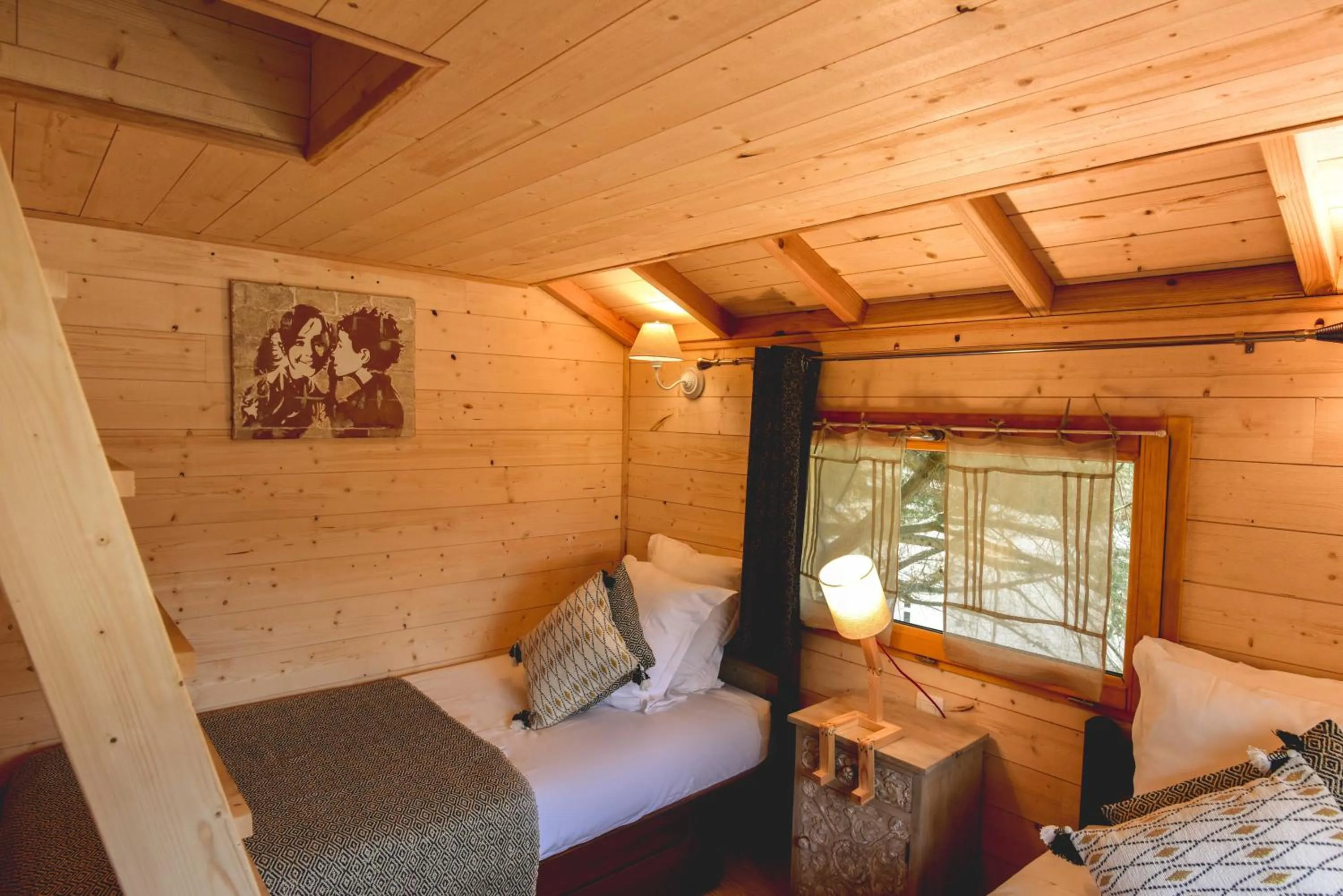 Bed in Logis Hôtel Emeraude des Bois