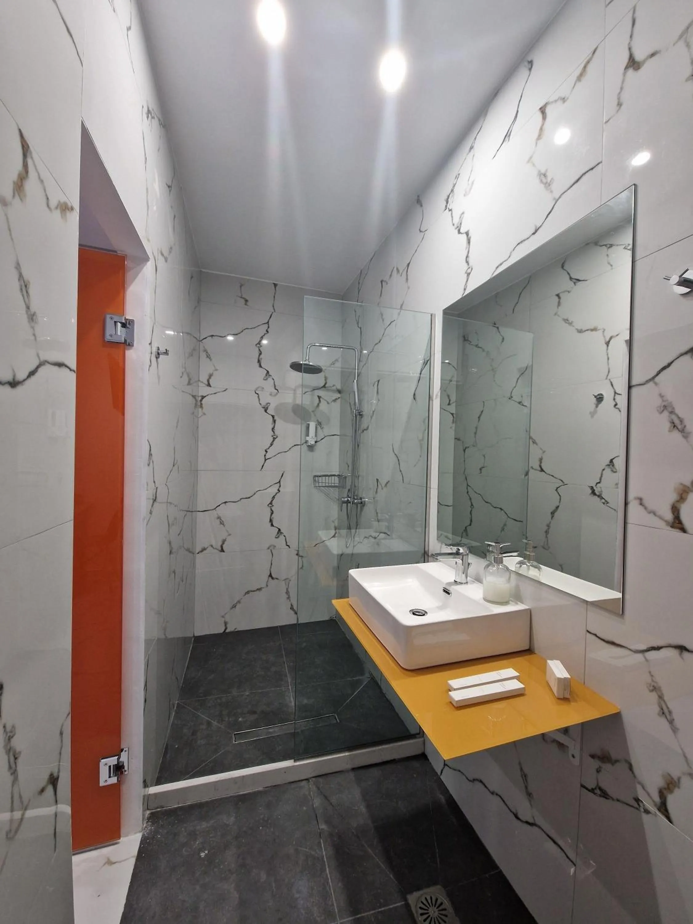 Shower in City Center Studios by Cretan Houses