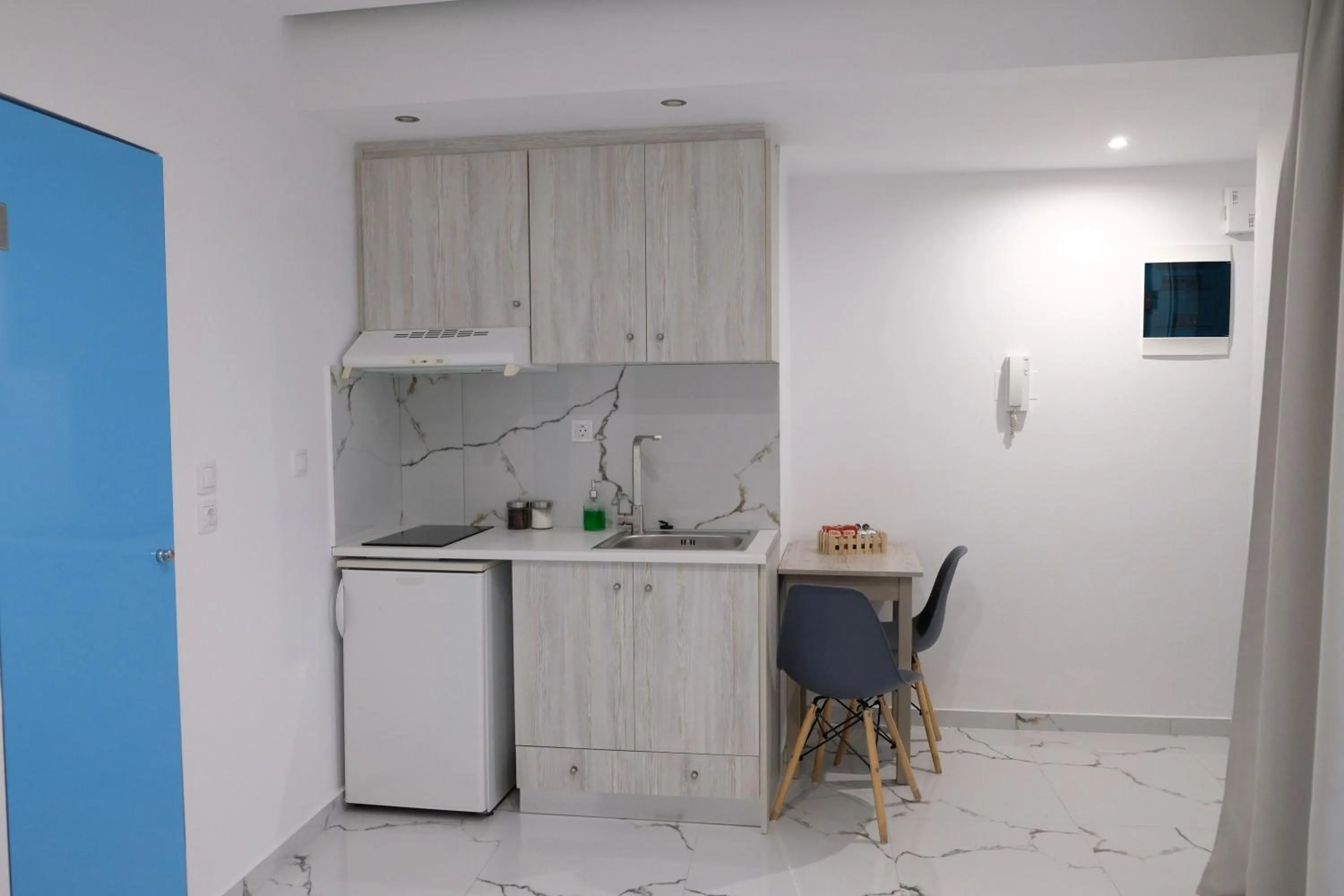 Kitchen or kitchenette in City Center Studios by Cretan Houses