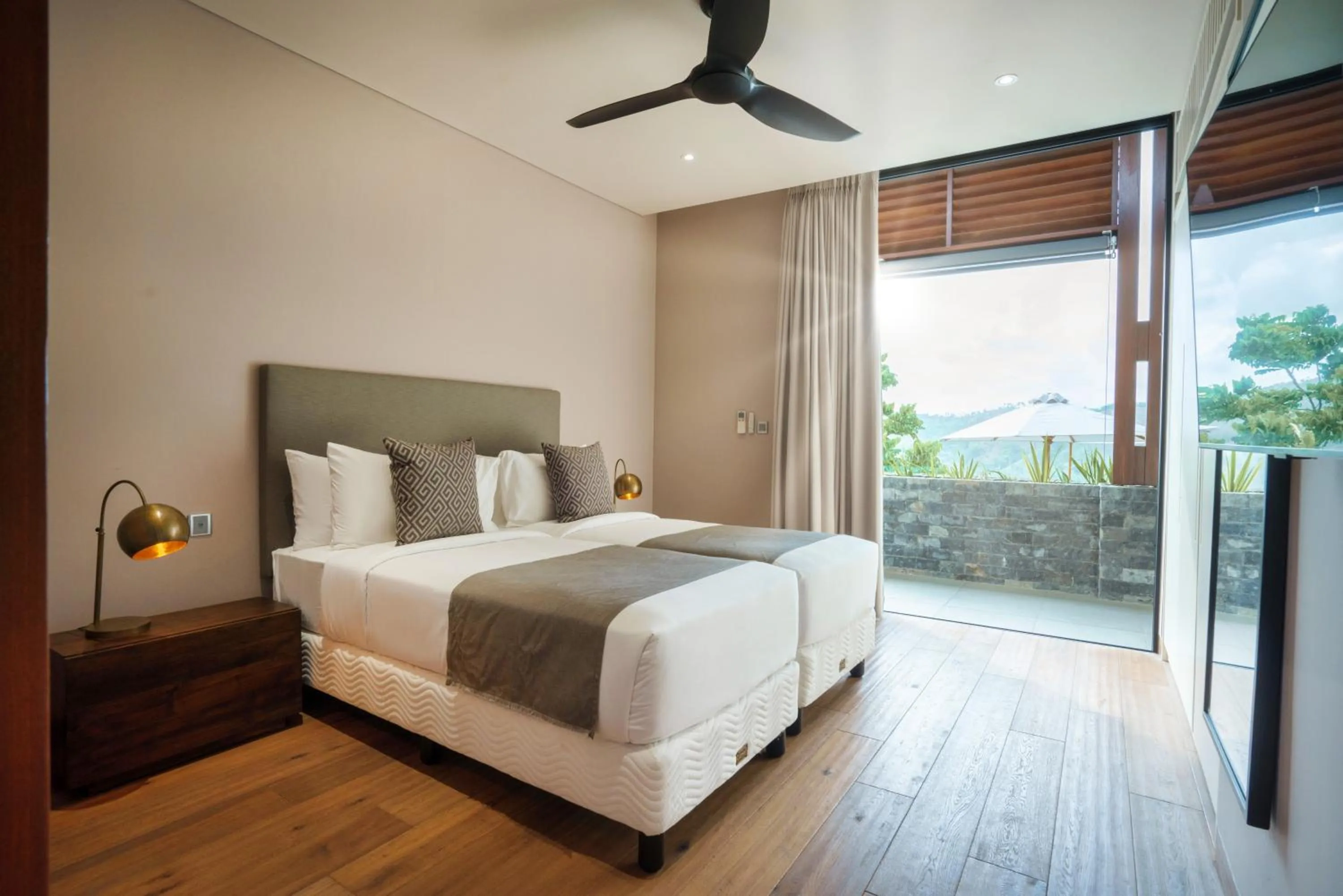 Bed in Selong Selo Resort and Villas