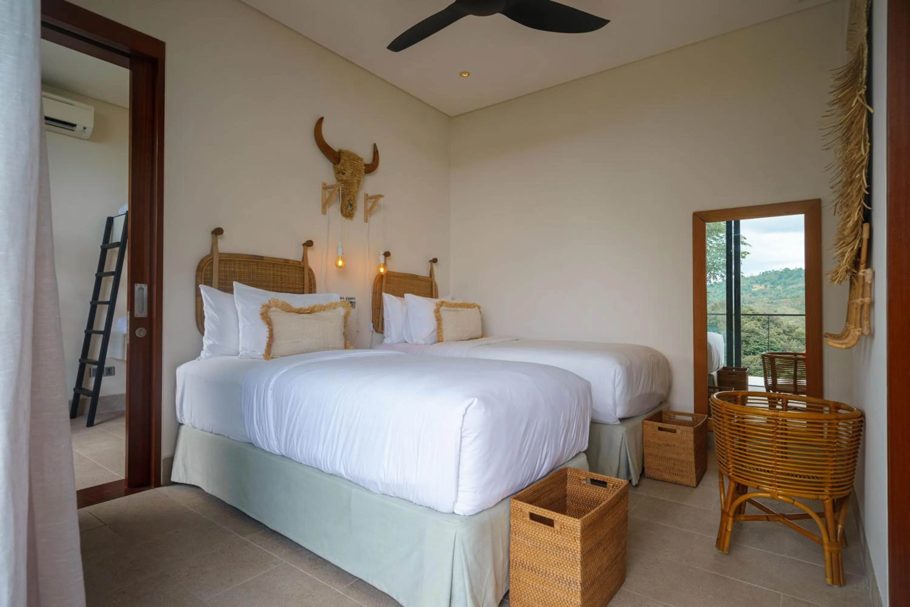 Bed in Selong Selo Resort and Villas