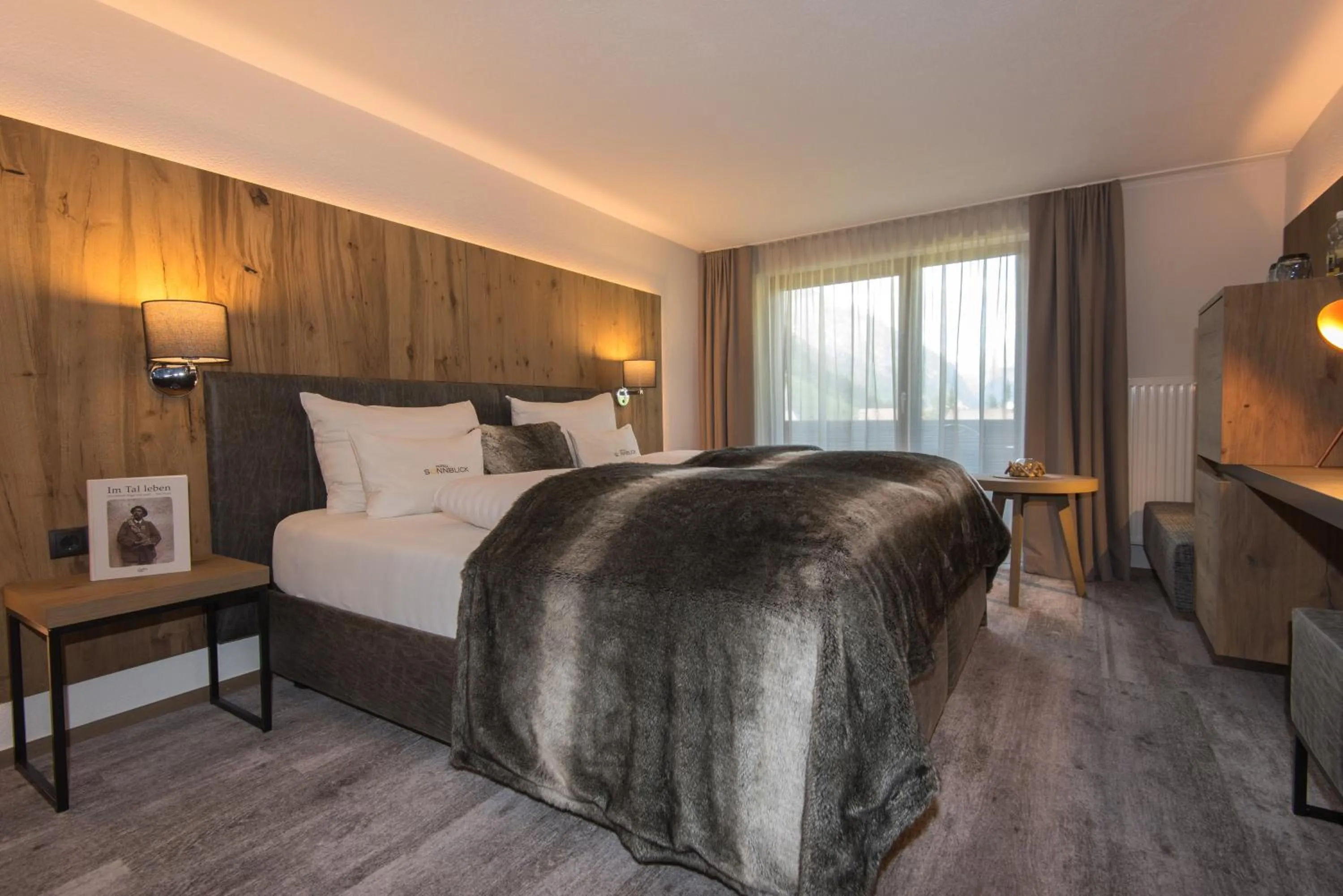 Bed in GenussHotel Sonnblick