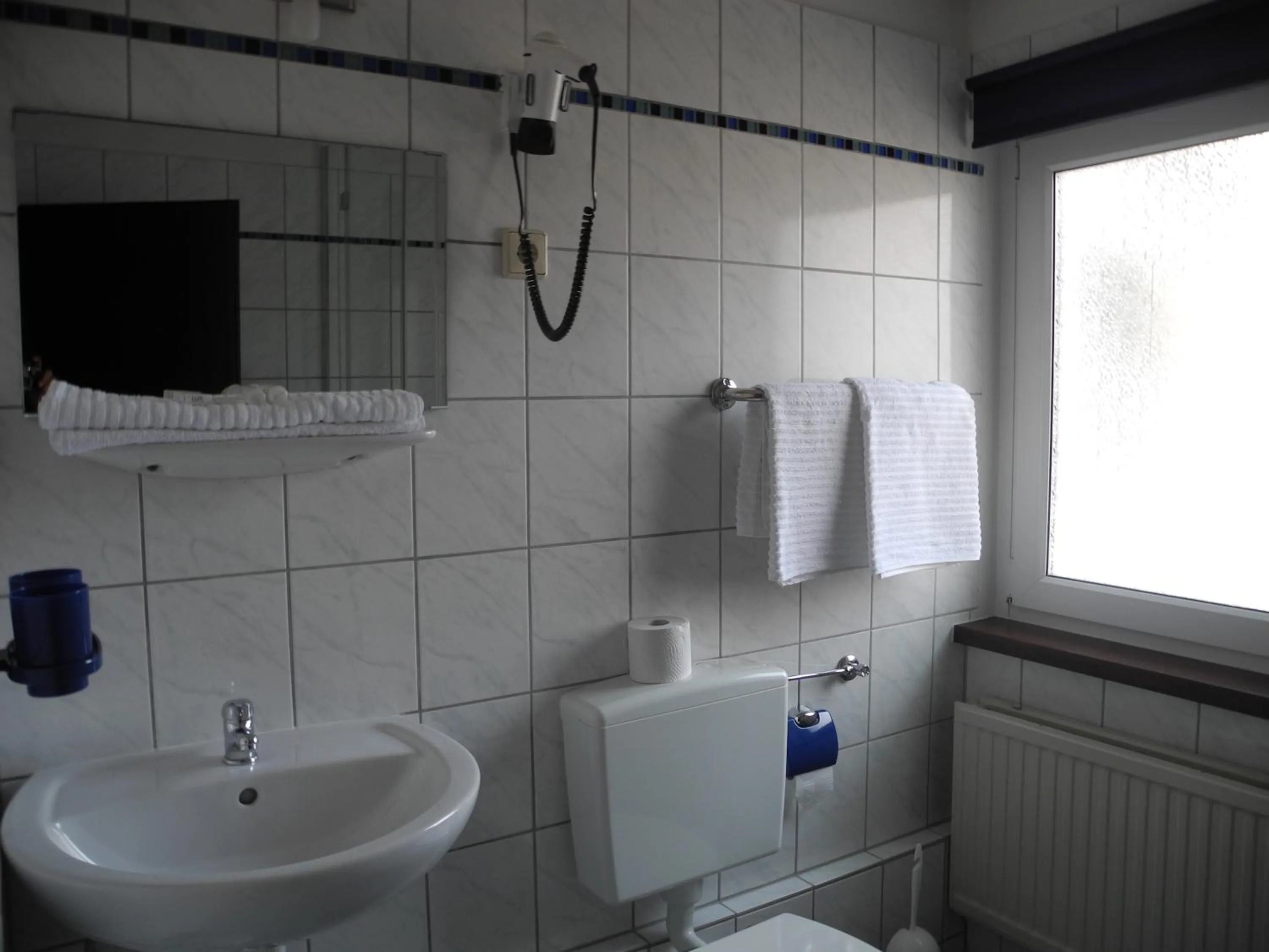 Toilet in Paciello Restaurant Hotel