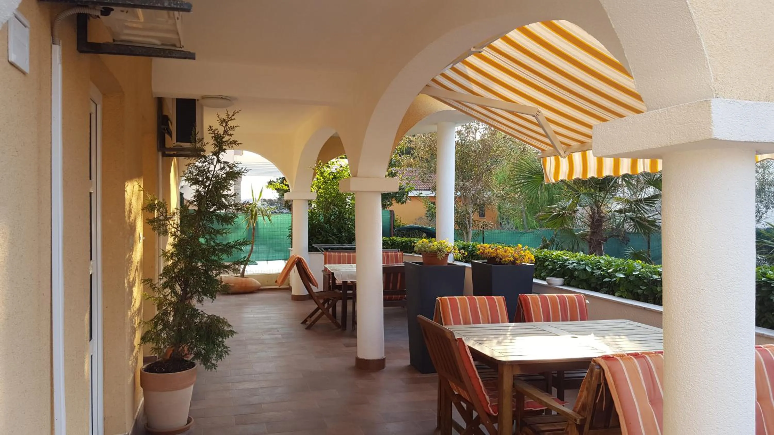 Garden in Villa Vanilla with Heated Pool