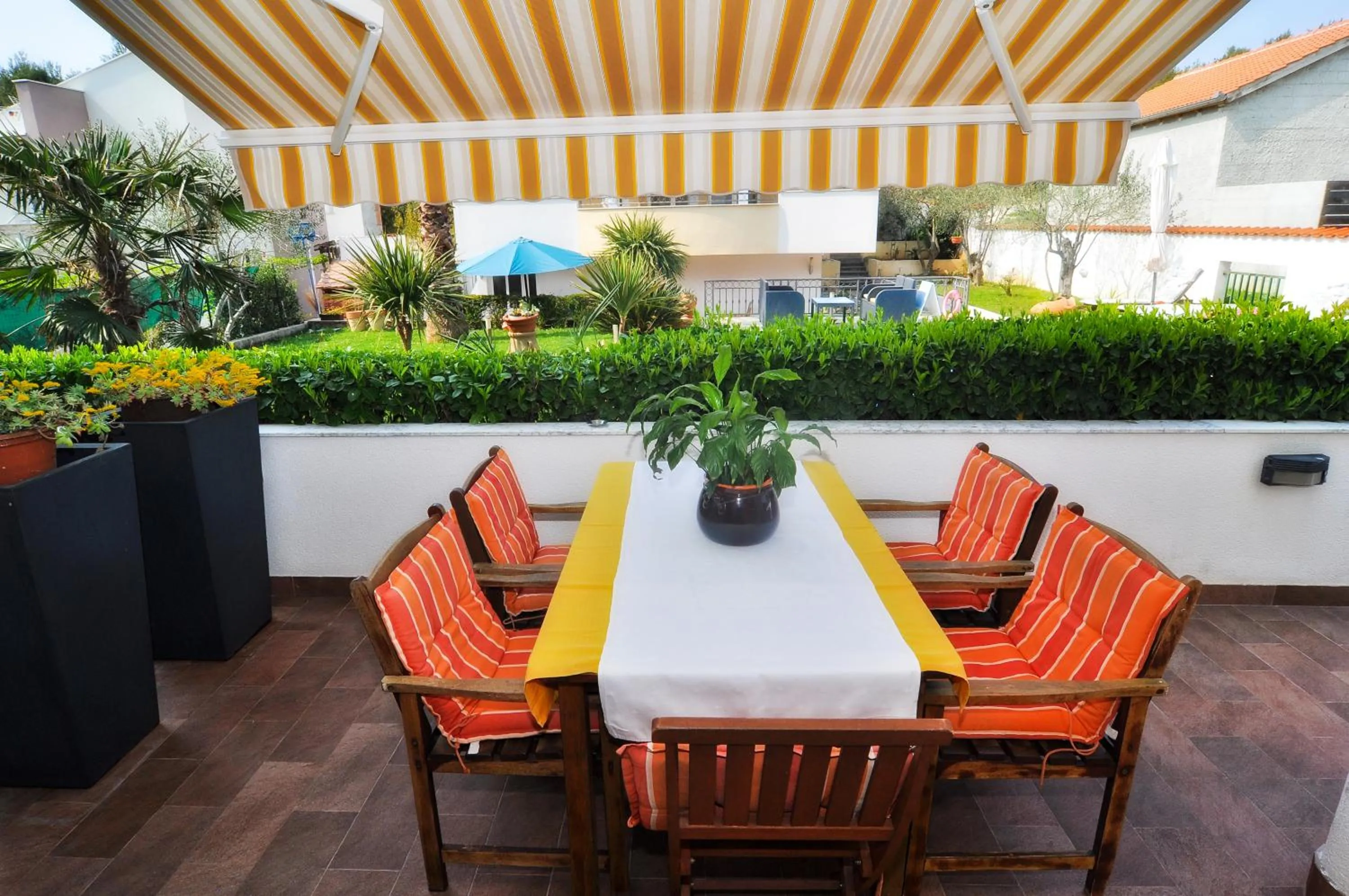 Garden in Villa Vanilla with Heated Pool