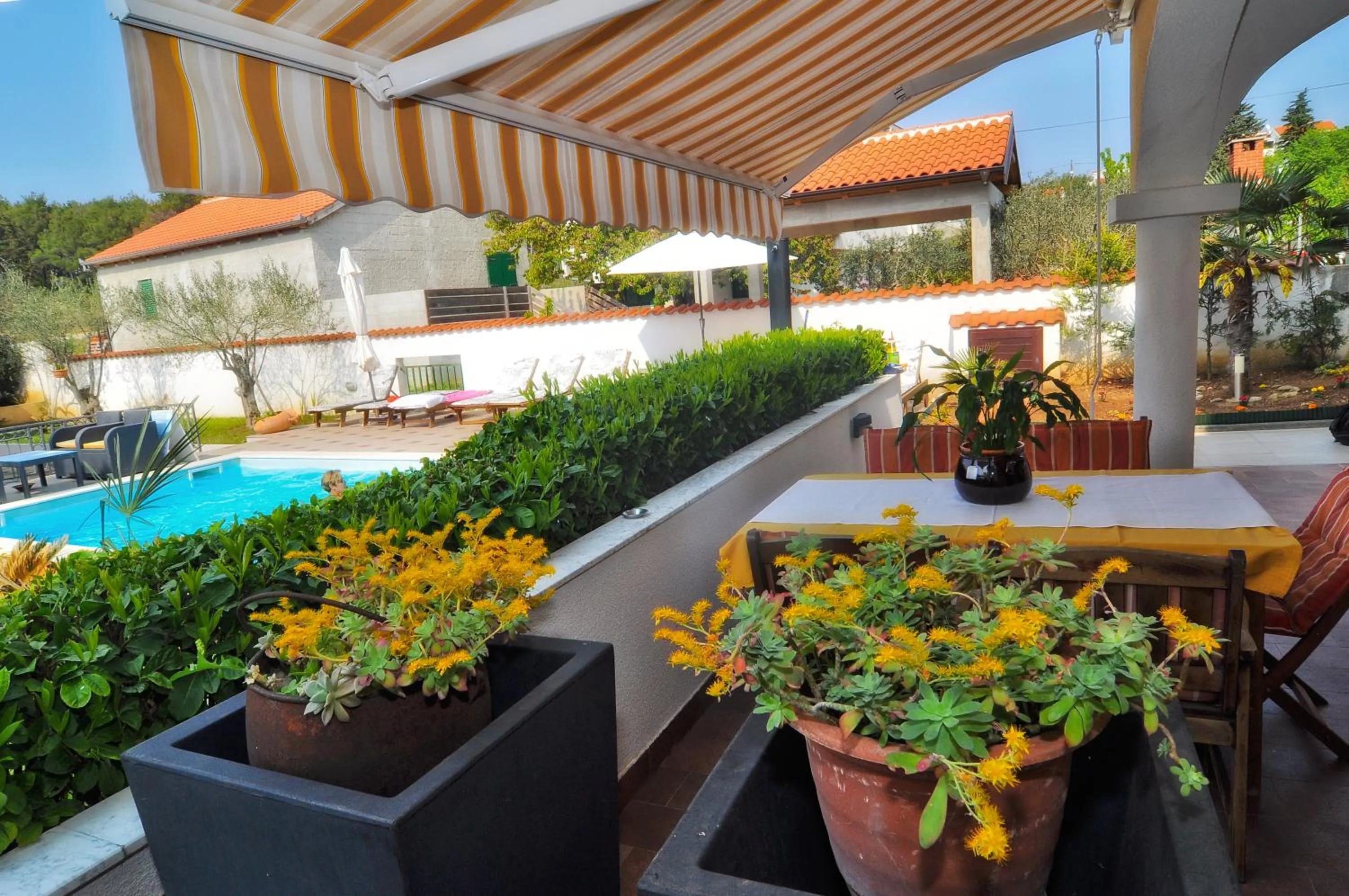 Garden in Villa Vanilla with Heated Pool