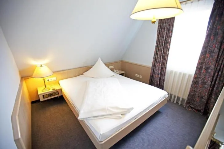 Bed in Hotel Hirsch