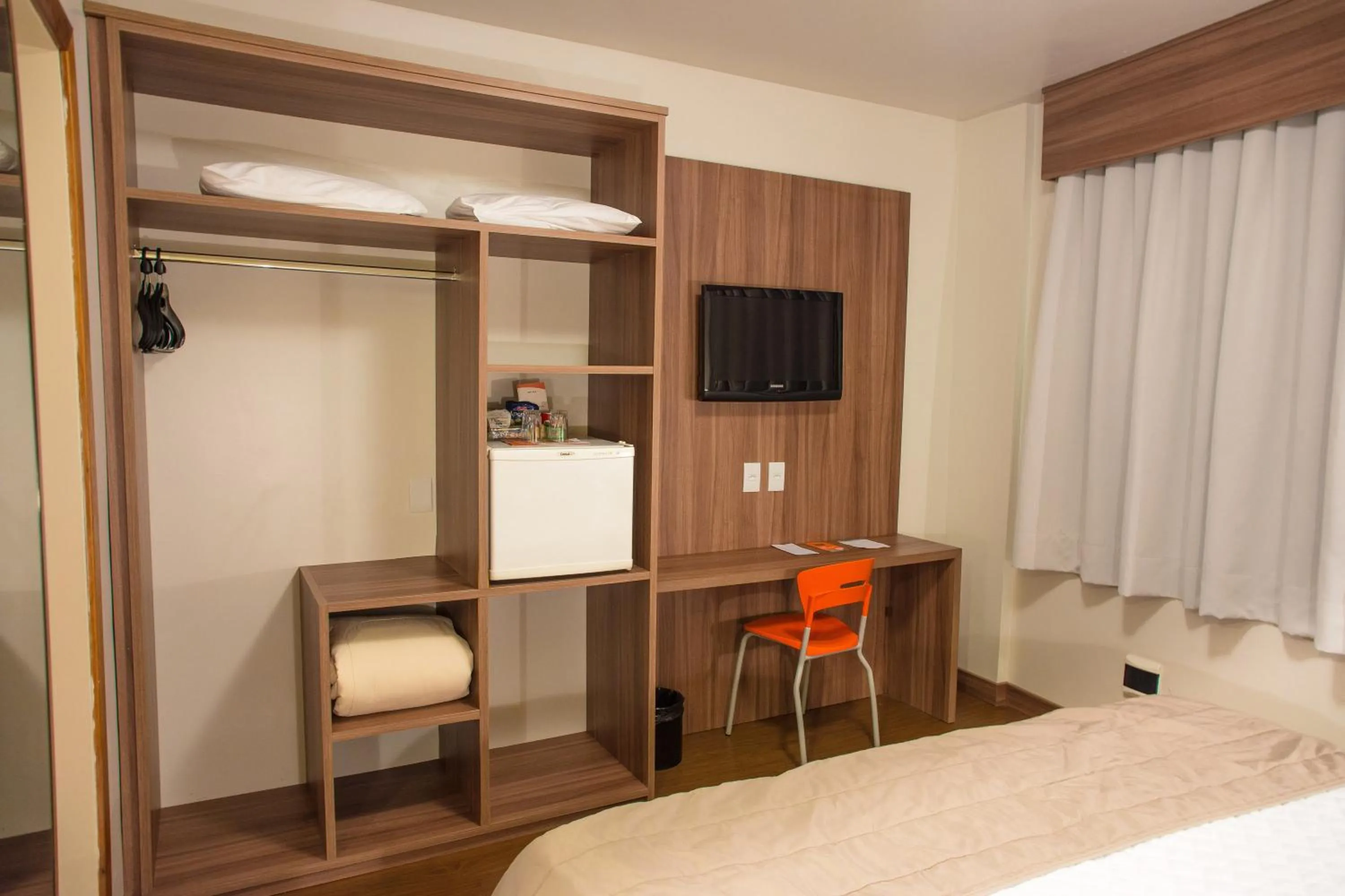 Photo of the whole room, Bed in Hotel Continental Business - 200 metros do Complexo Hospitalar Santa Casa