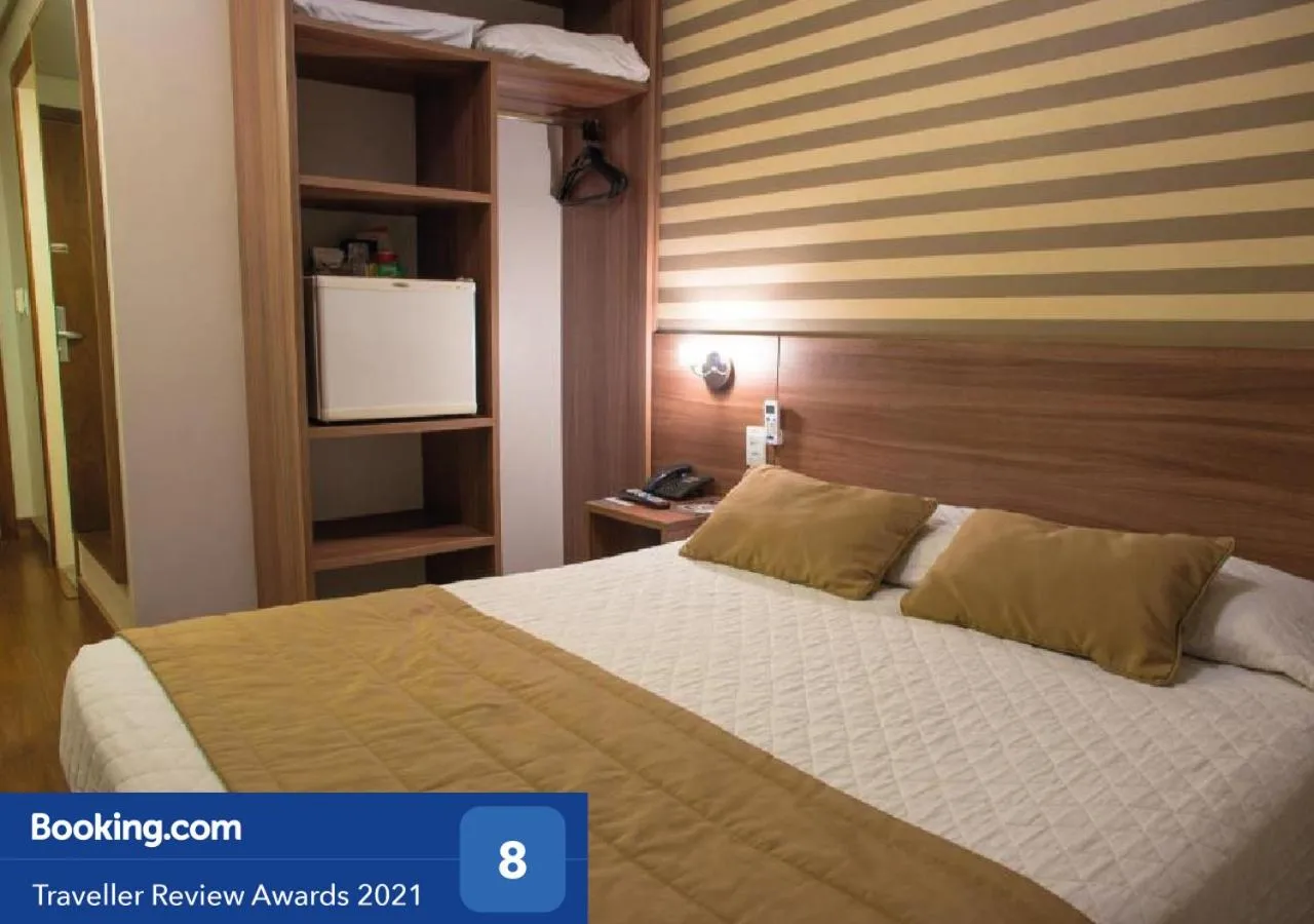 Photo of the whole room, Bed in Hotel Continental Business - 200 metros do Complexo Hospitalar Santa Casa