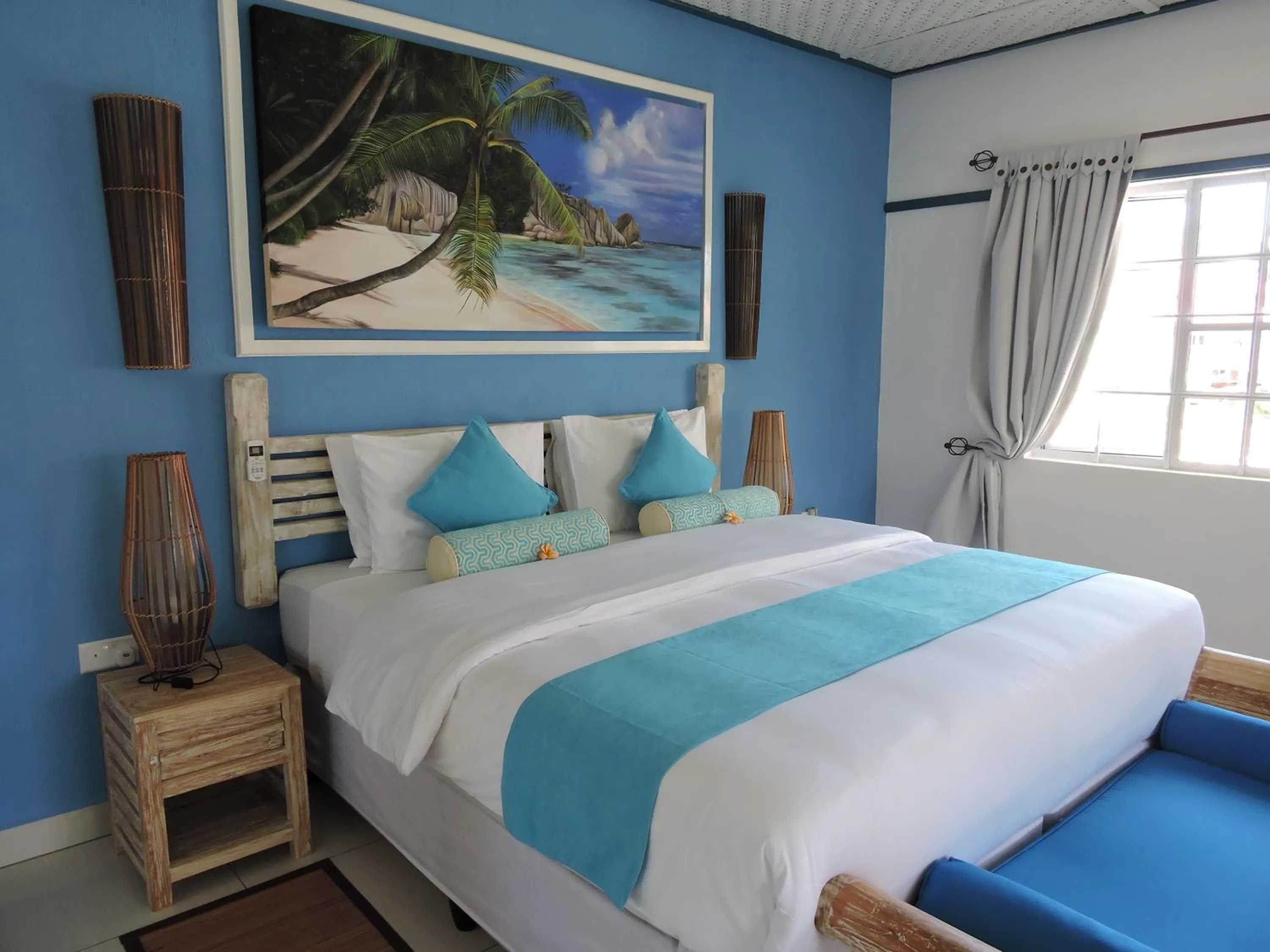 Bed in Villa Charme de L'ile