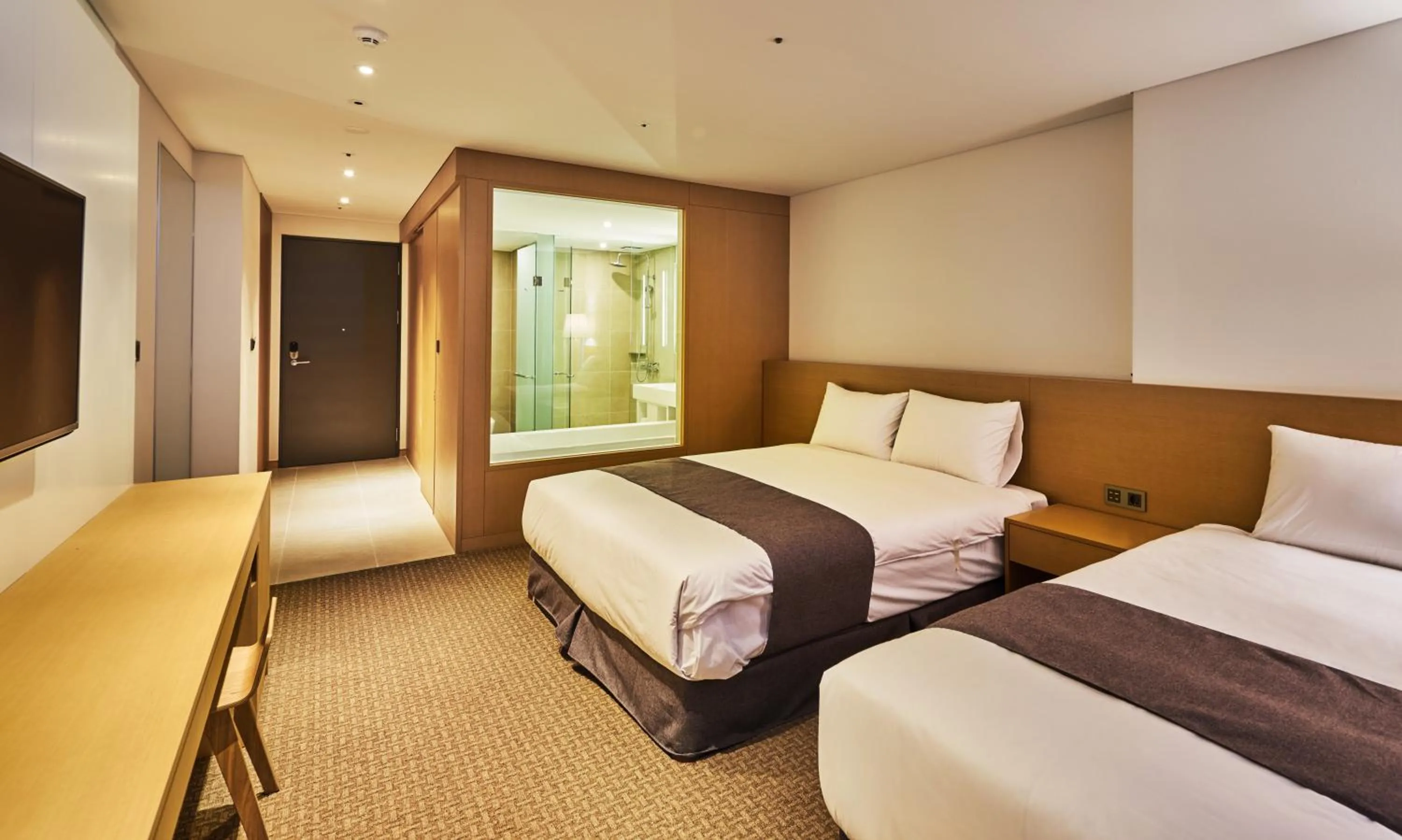 Bed in Naksan Beach Hotel